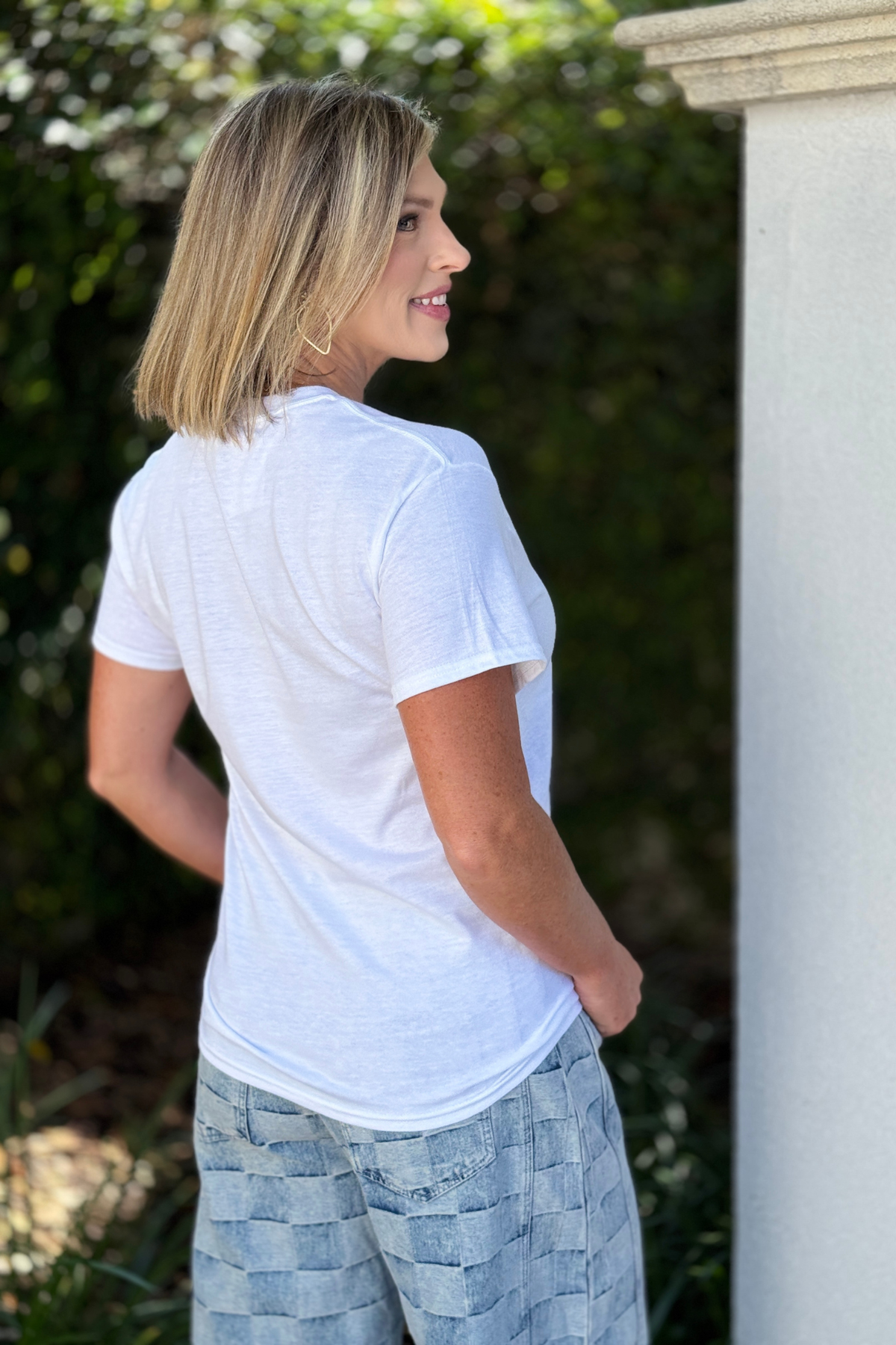 Back view of white Gildan graphic tee