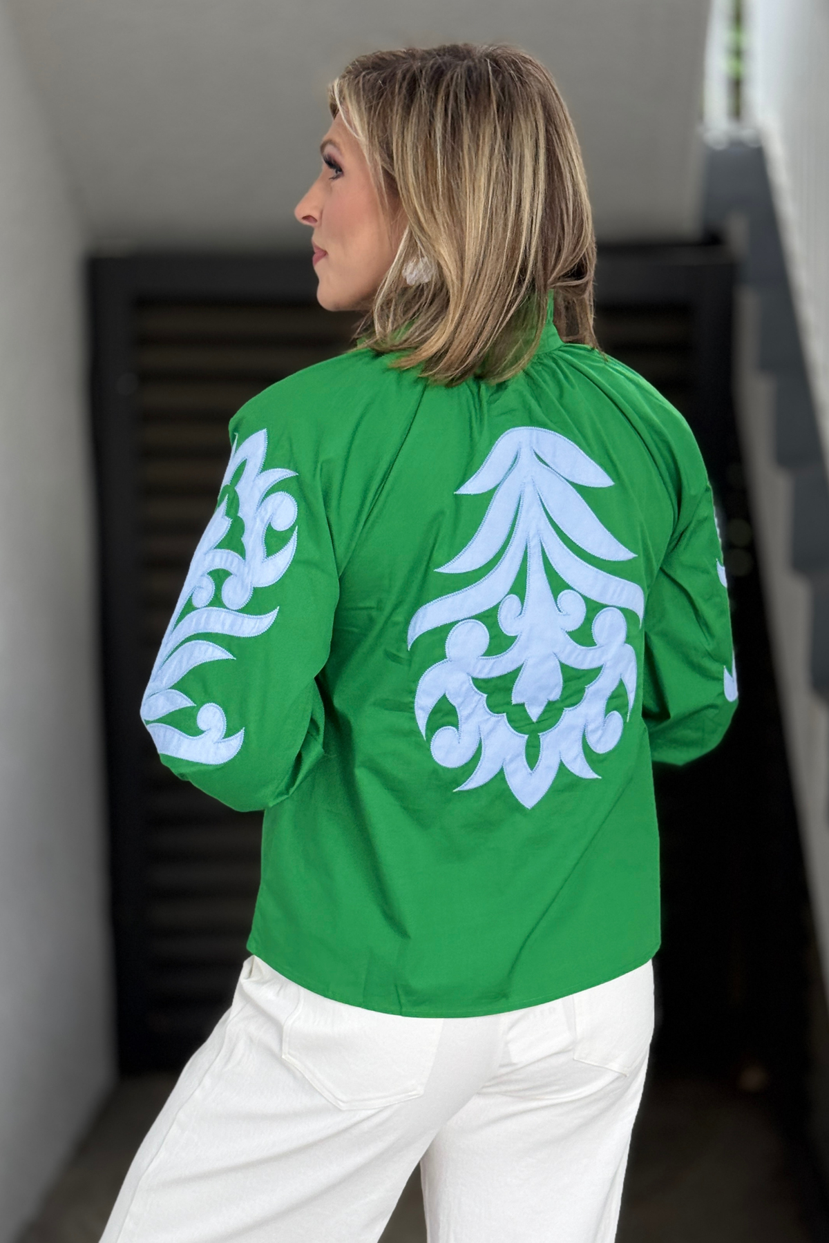 Elegant green 3/4 sleeve blouse with appliqué accents