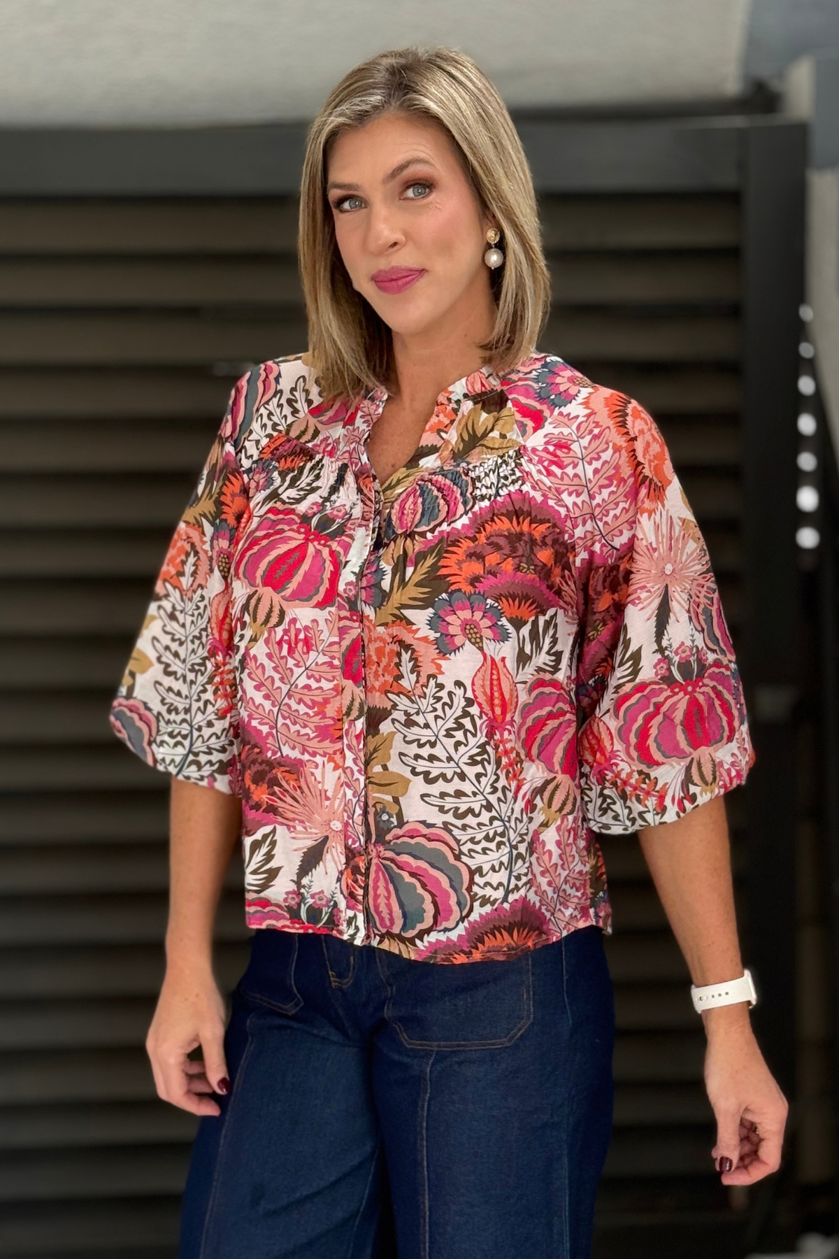 Lined floral blouse with covered button placket