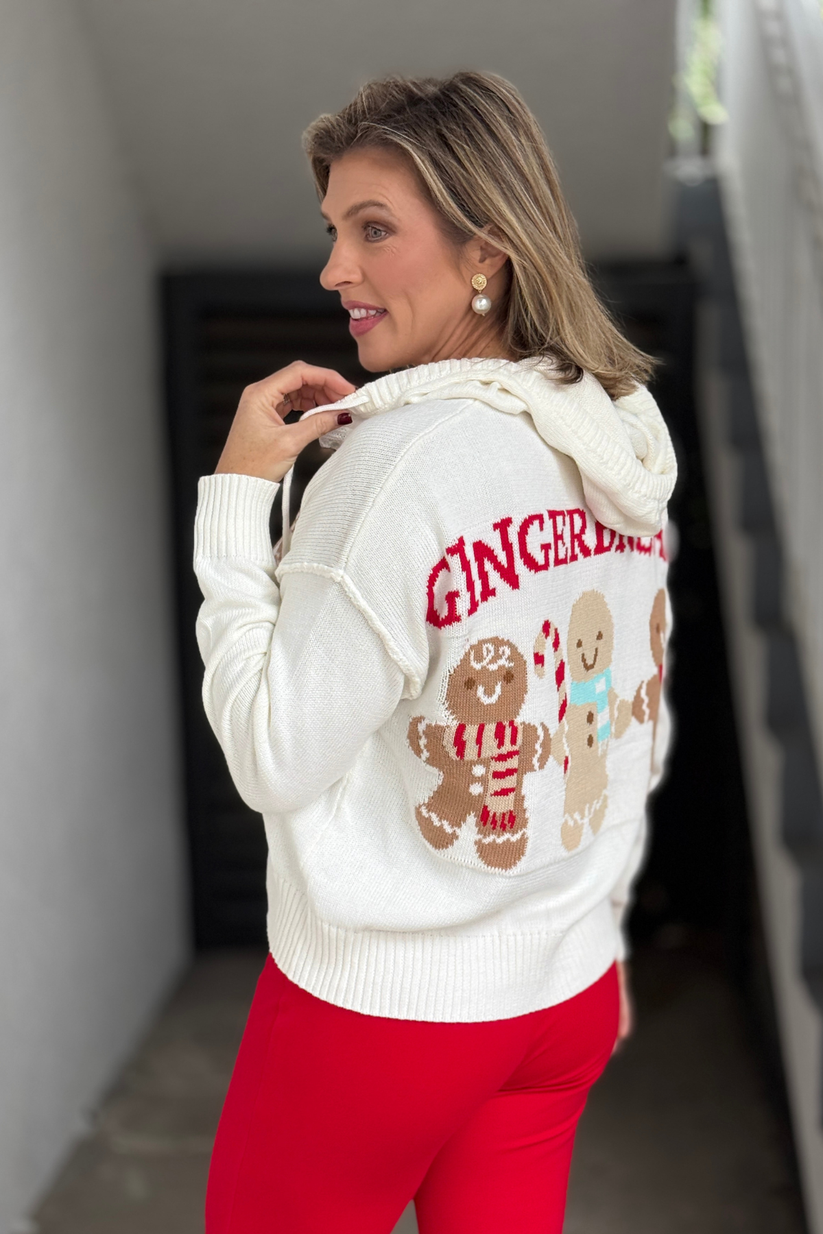 Christmas cardigan with gingerbread character on front