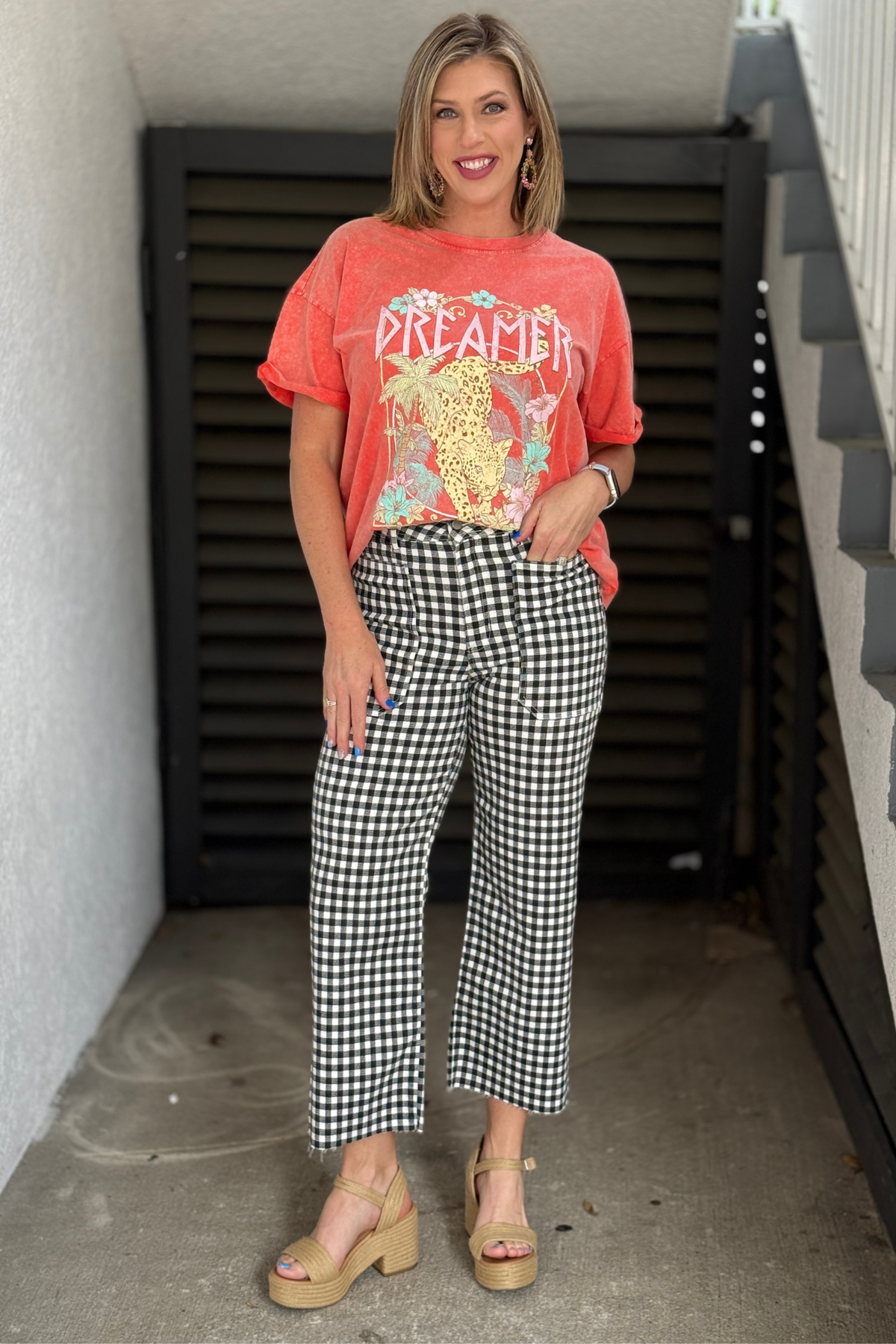 gingham wide leg jeans styled with coral graphic tee