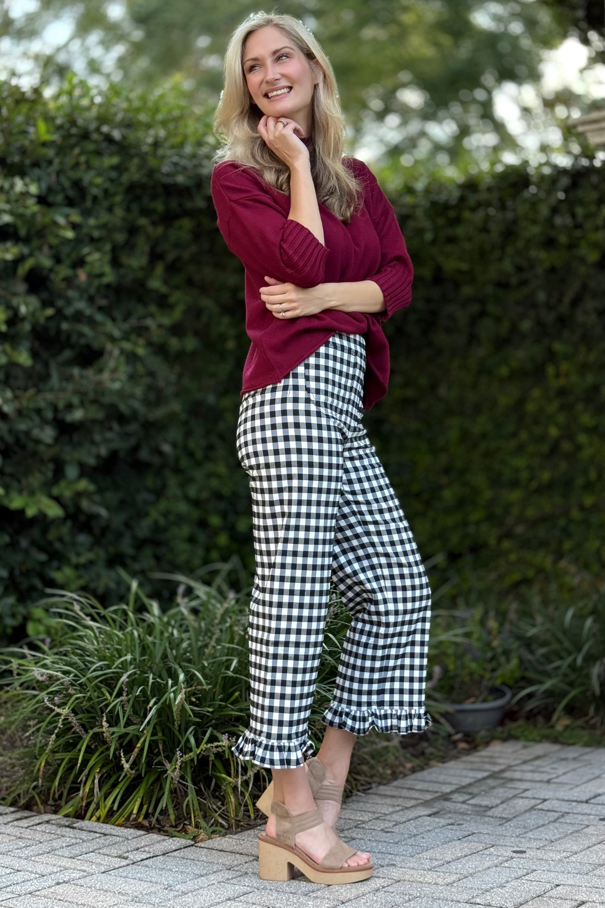 Side view showing cropped straight leg silhouette and patch pocket