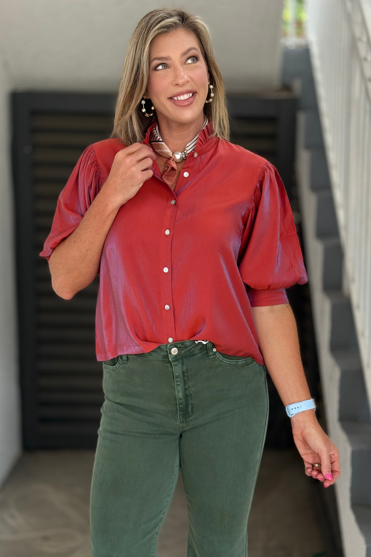Rust metallic puff sleeve blouse.