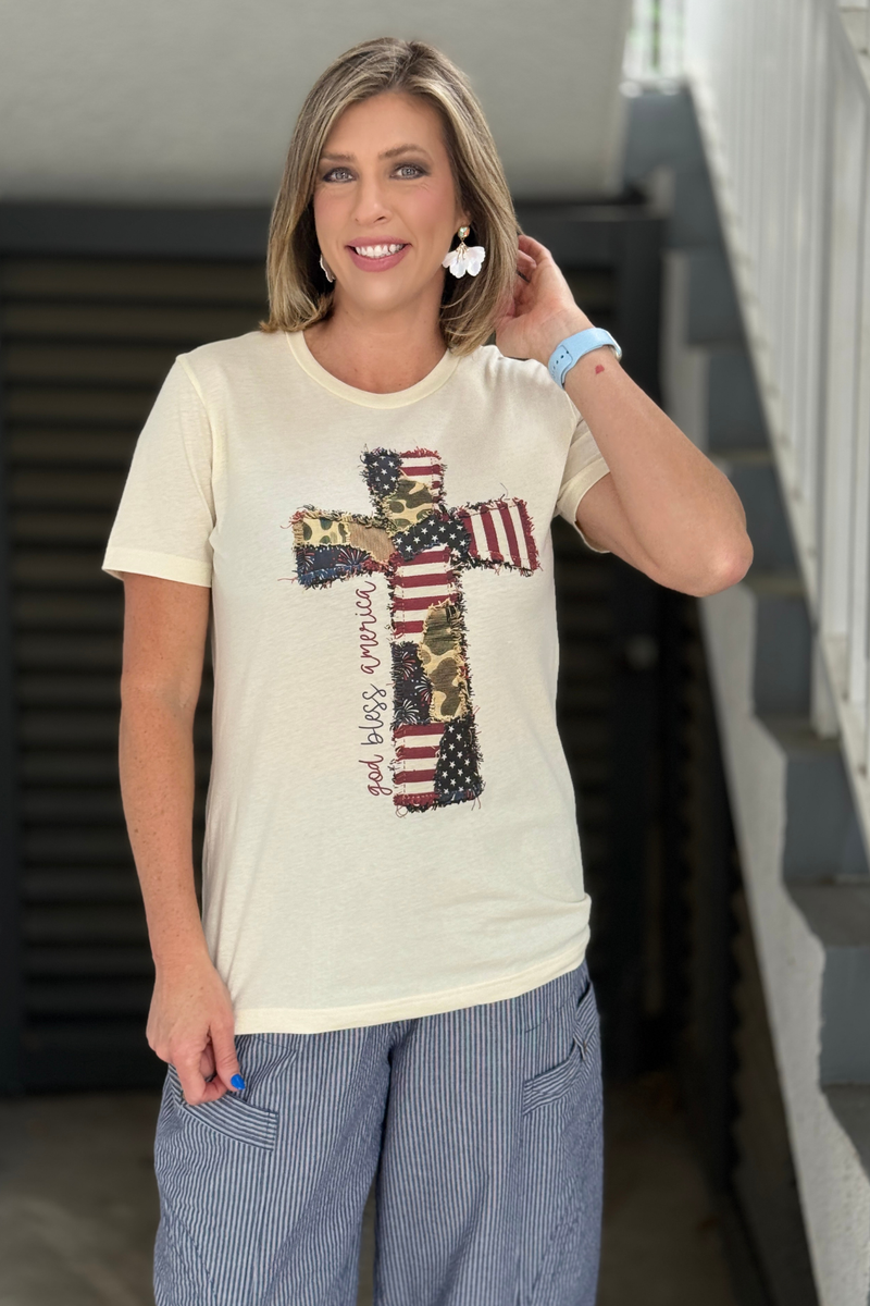 patriotic graphic tee with patchwork cross and american flag design