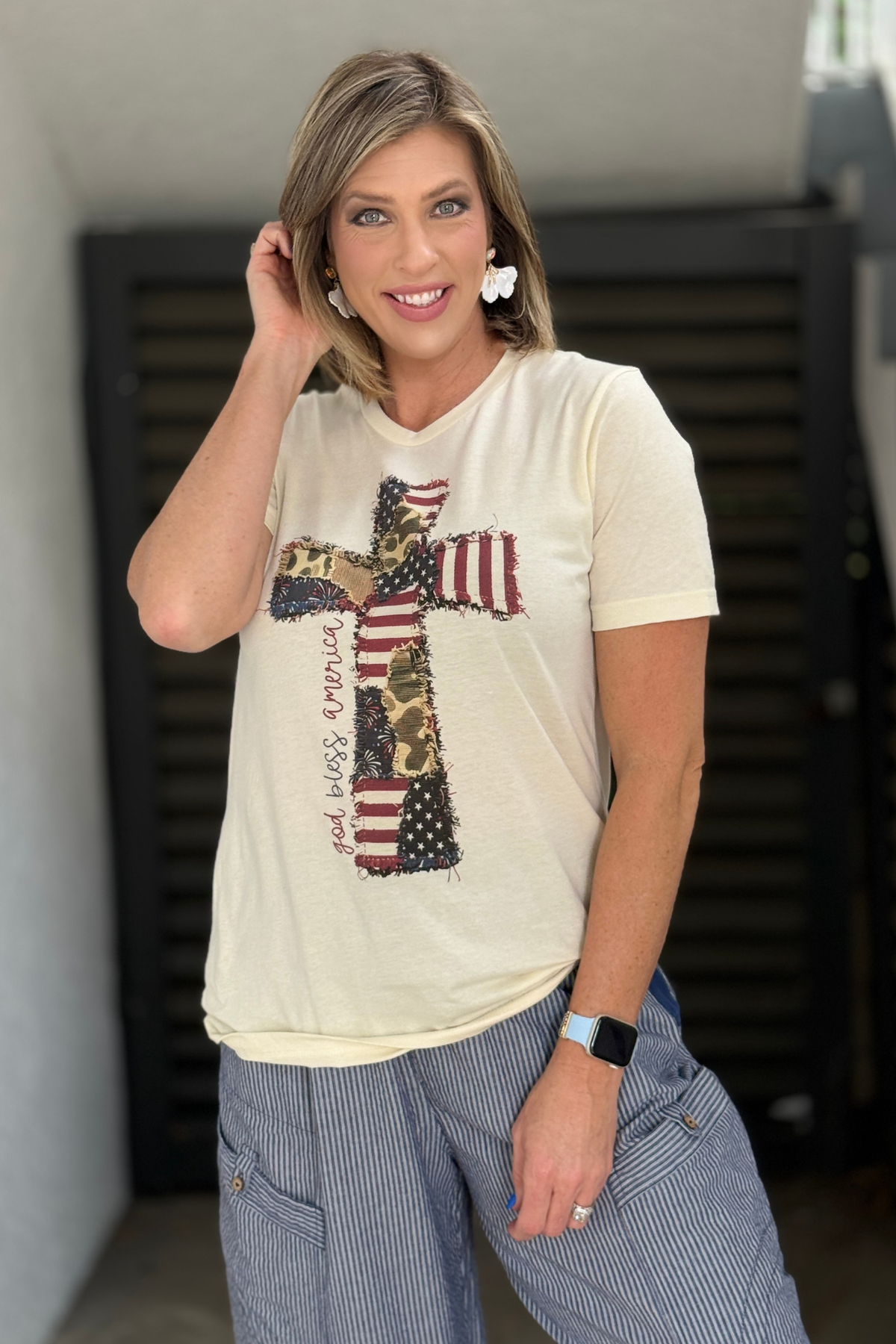 god bless america cross t shirt styled with striped pants