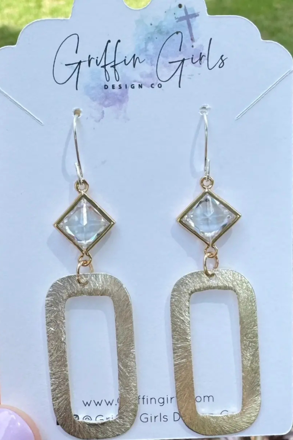 Silver oval drop earrings with diamond shaped crystal