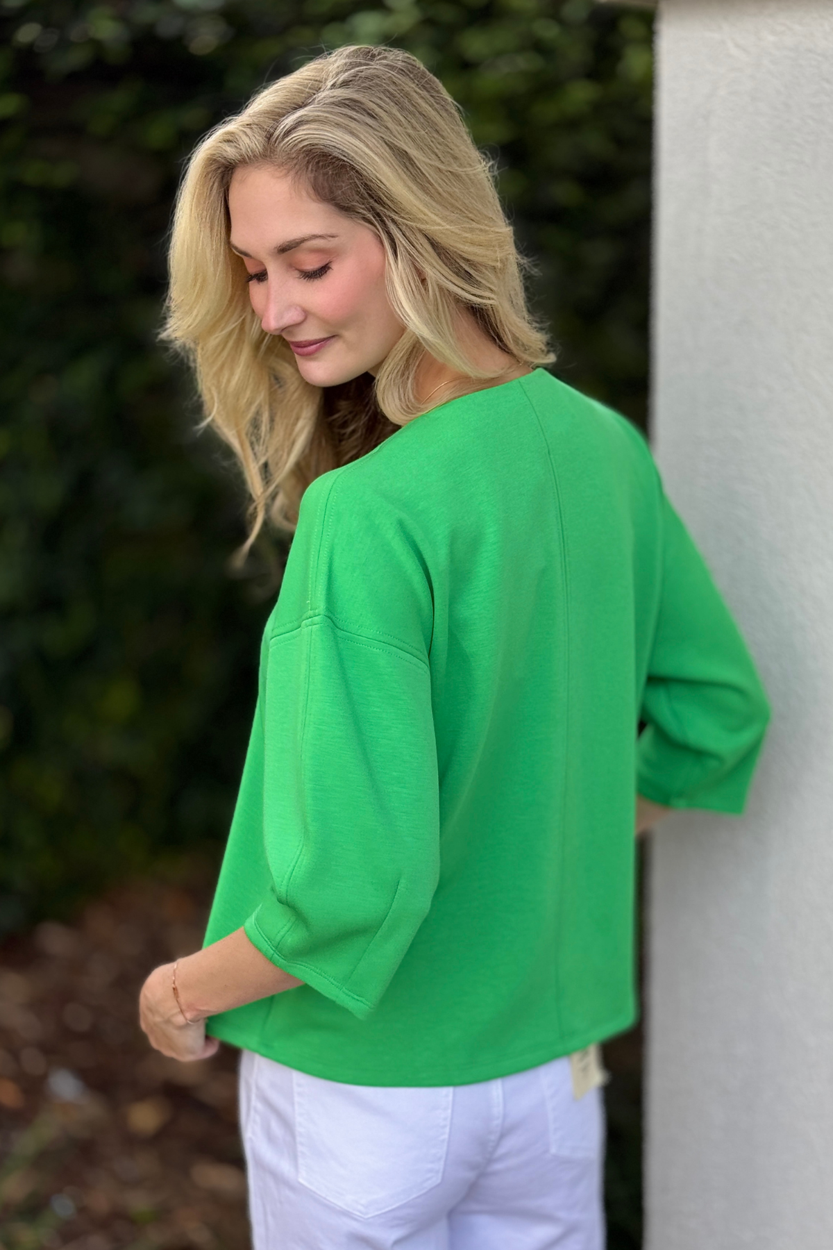 Soft textured solid green V-neck summer top