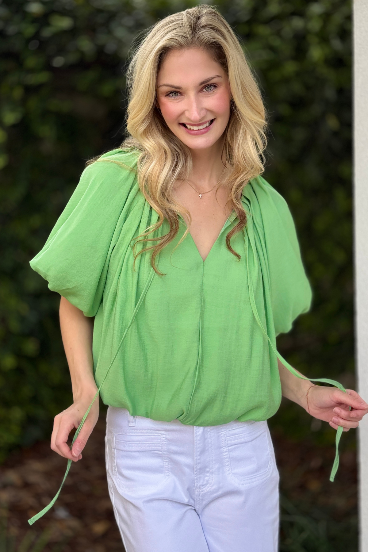 Green balloon sleeve blouse with tie neck detail