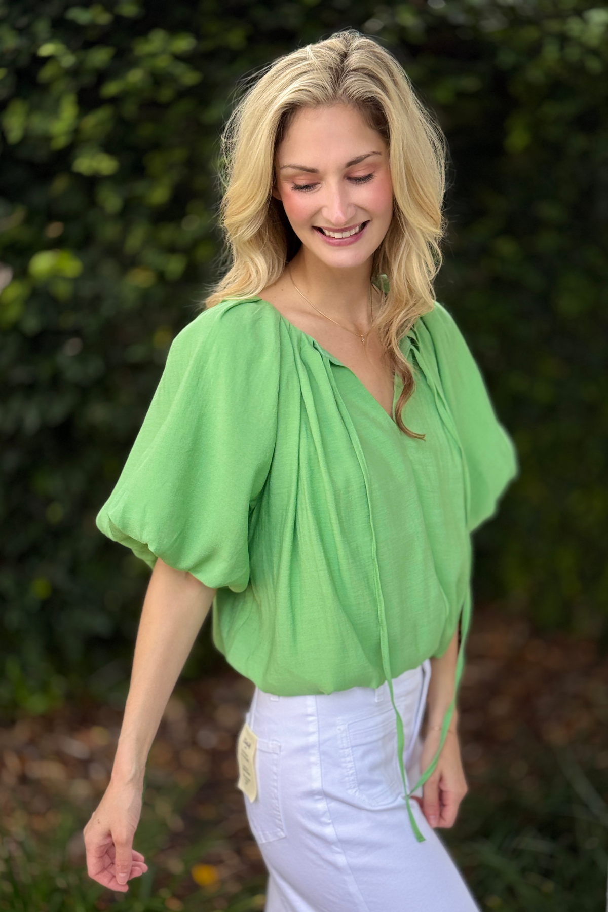 Spring 2026 green statement sleeve blouse