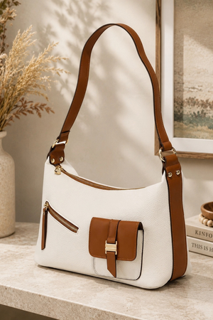 Laya convertible shoulder bag in beige with tan trim