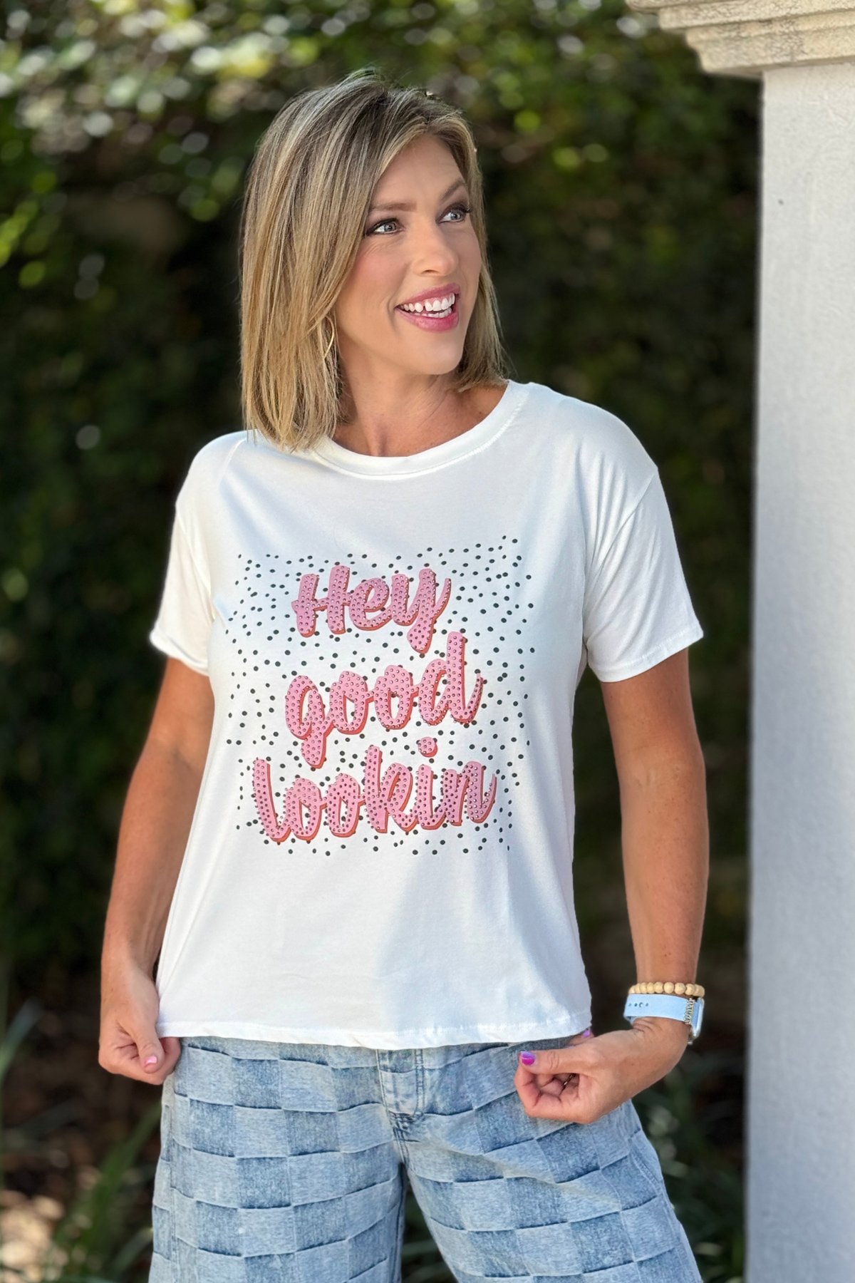 Hey Good Lookin’ Tee front view with pink embellished graphic
