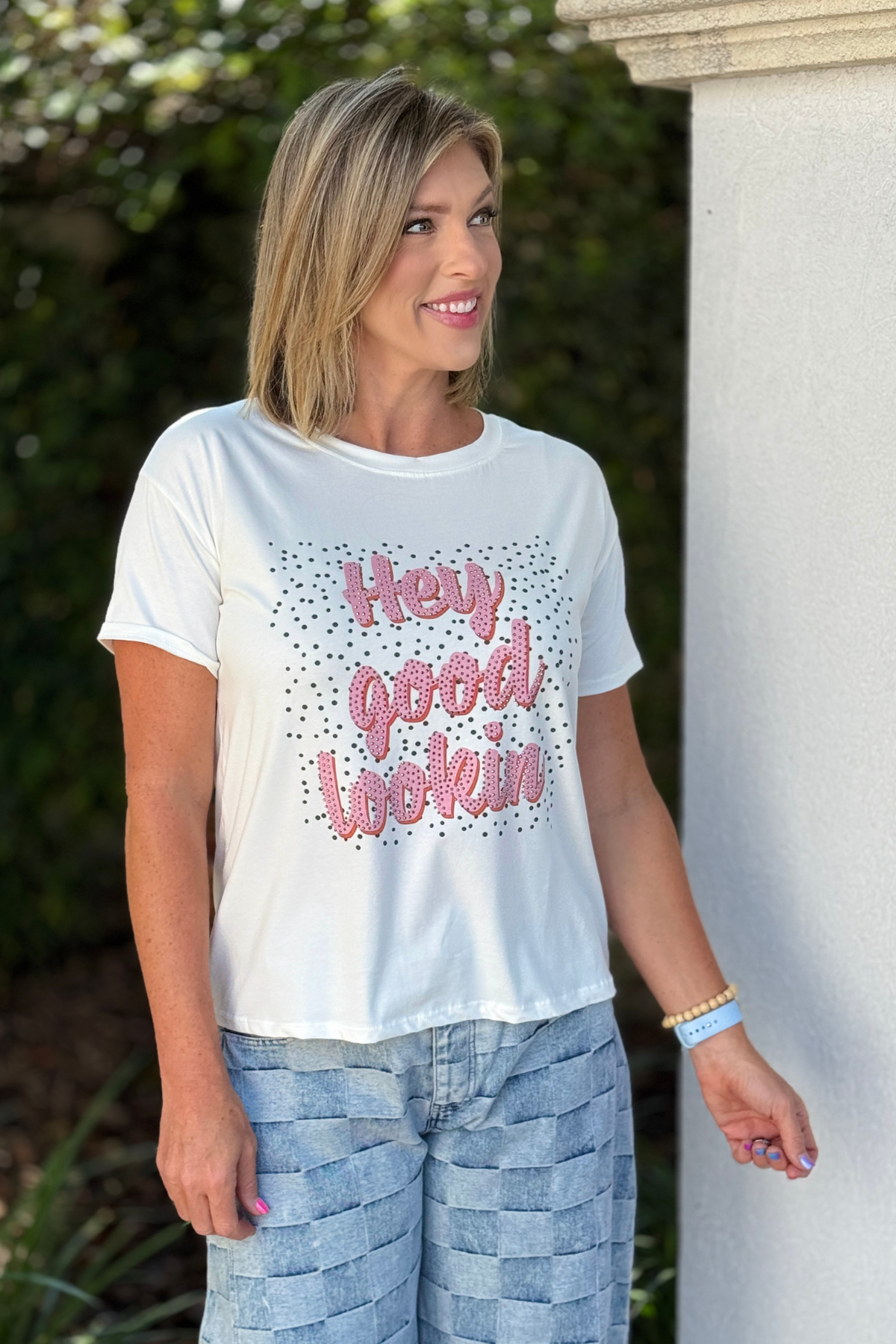 White made in Italy graphic tee styled with denim pants