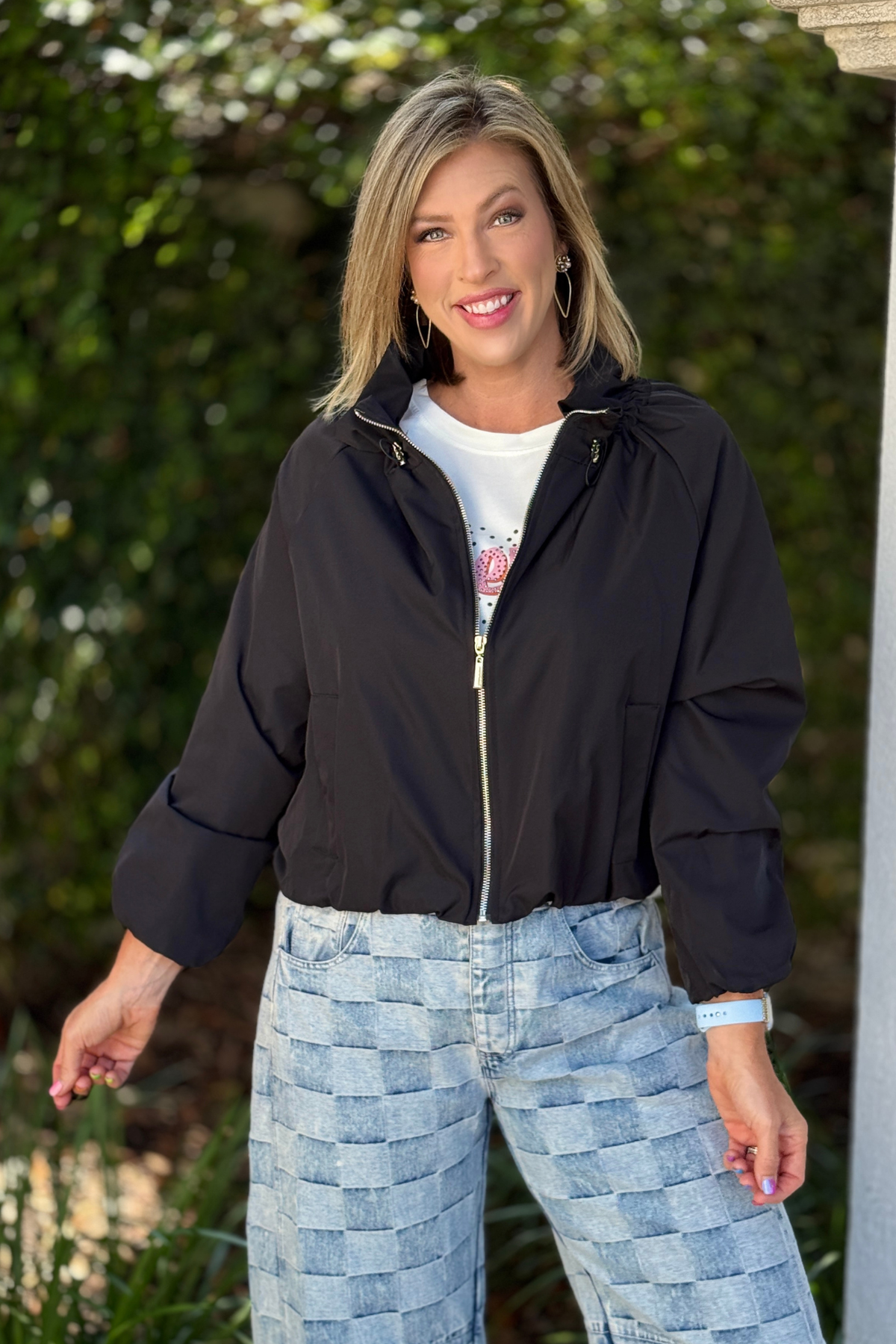 Black made in Italy zip front jacket with gathered neckline