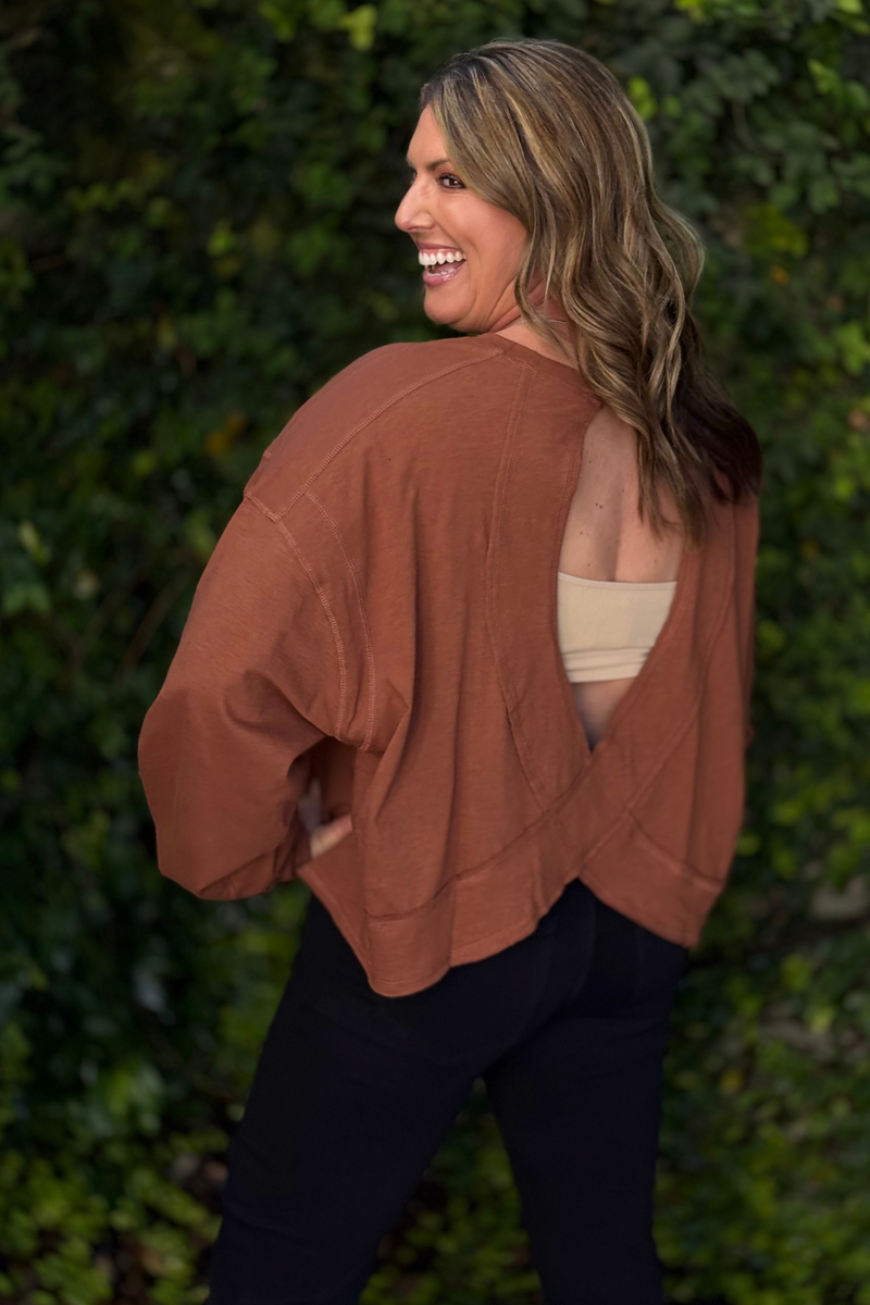 Back view of crossback slub top with open design