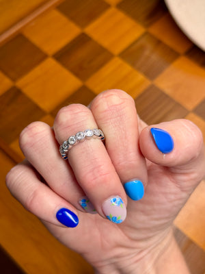 moissanite eternity band on hand