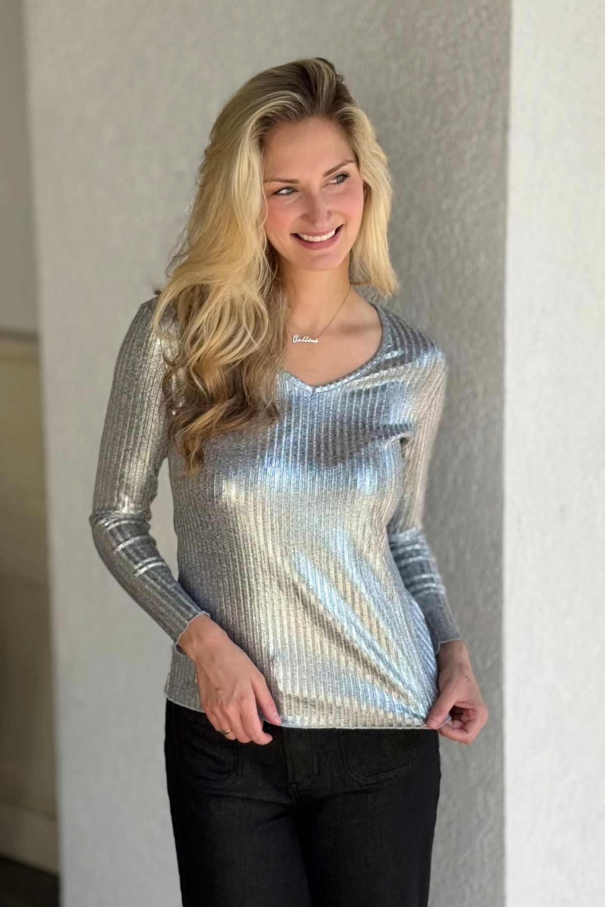 Shine with effortless sophistication—Insight New York’s Radiance Metallic Top in Silver is your go-to for day-to-night glamour