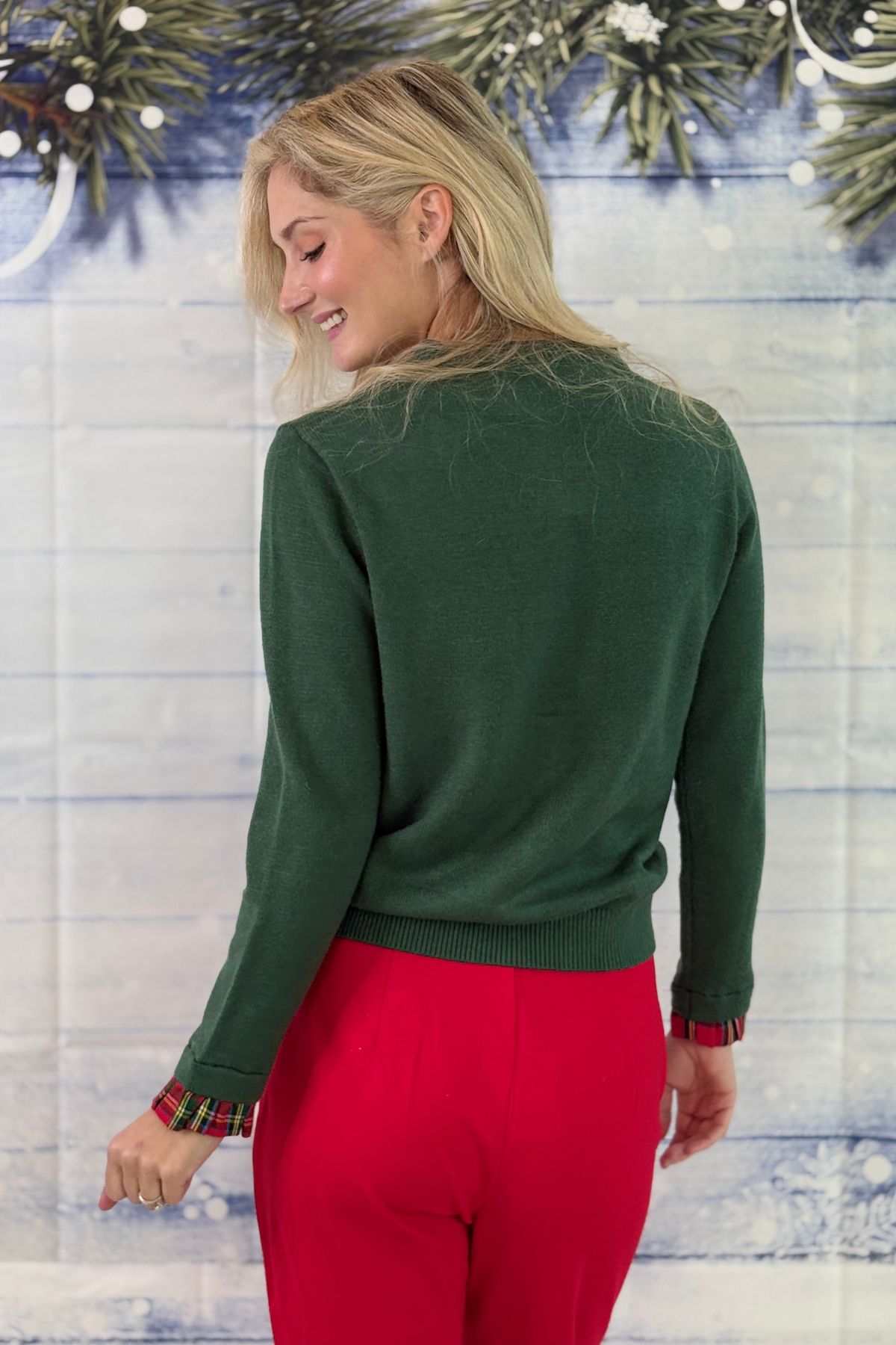 Women’s green and red Christmas cardigan for Christmas 2026