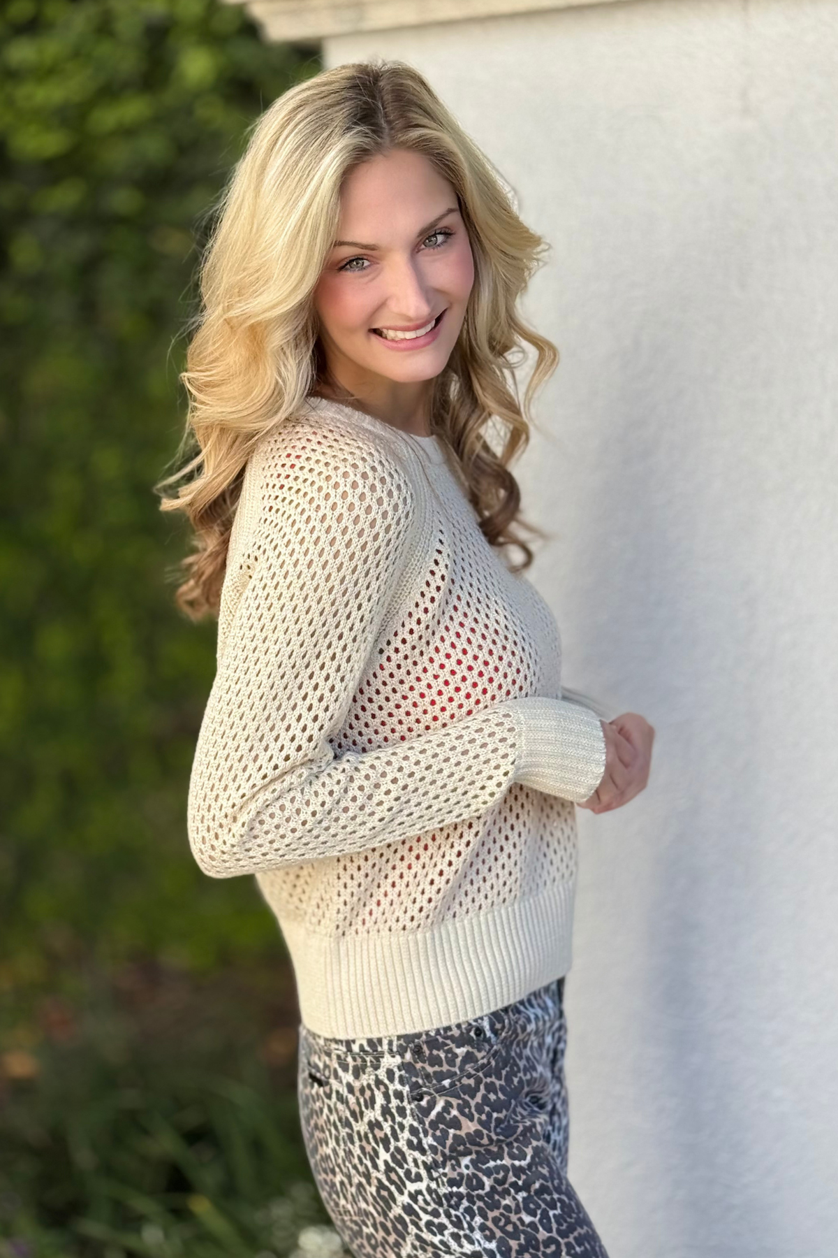 J. Society metallic sweater styled with leopard pants