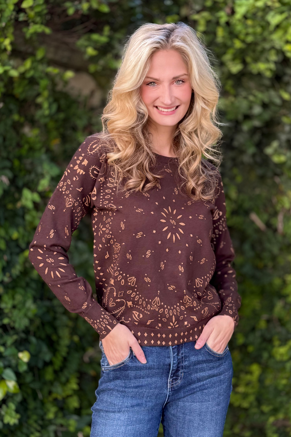 Close-up of brown bandana print knit sweater pattern