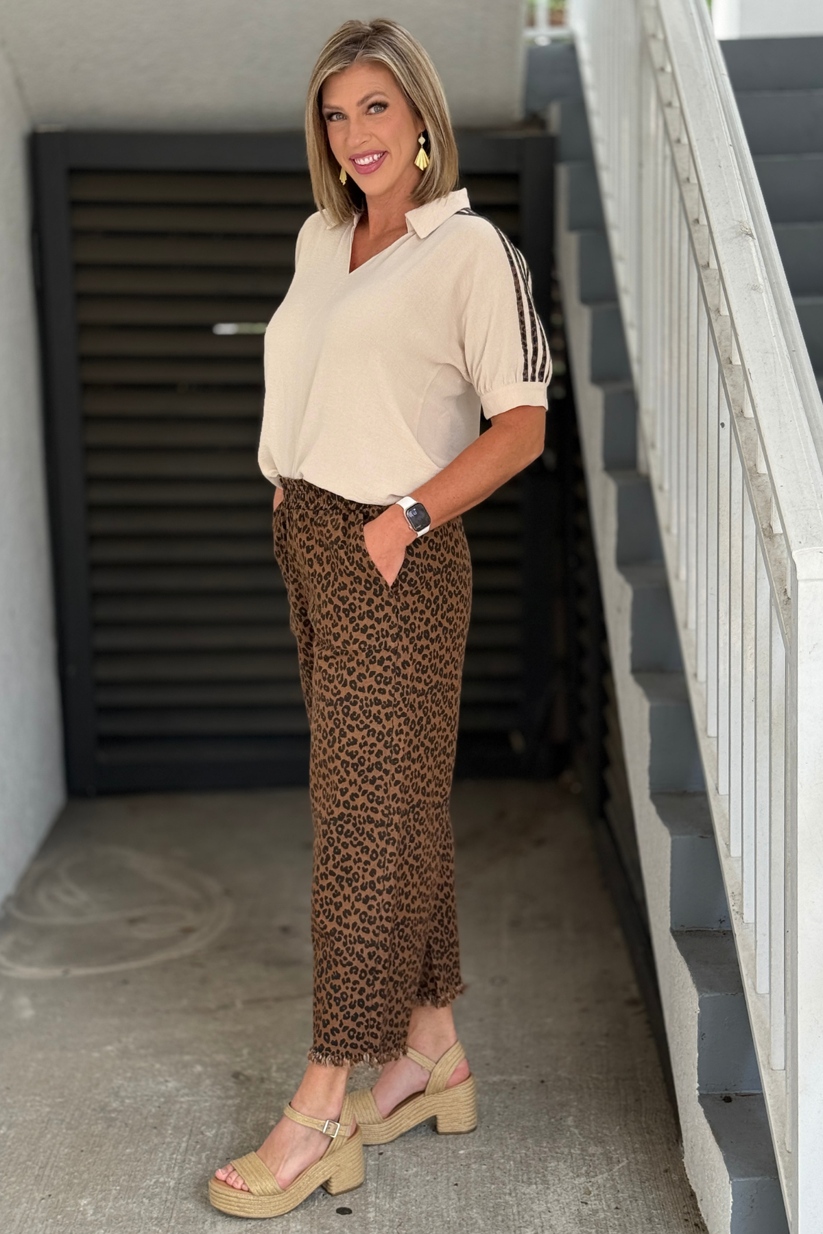 Cropped leopard wide leg pants with frayed hem detail