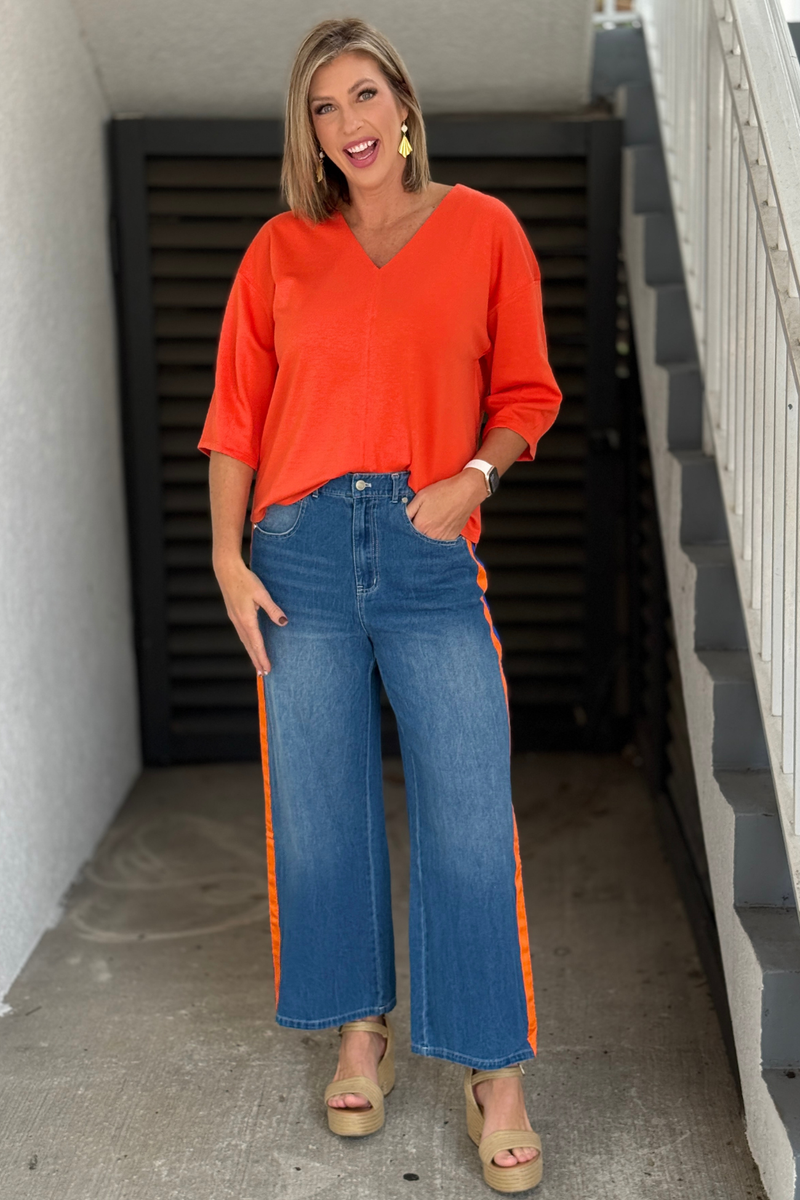 Game Day Energy royal blue and orange side stripe denim pants