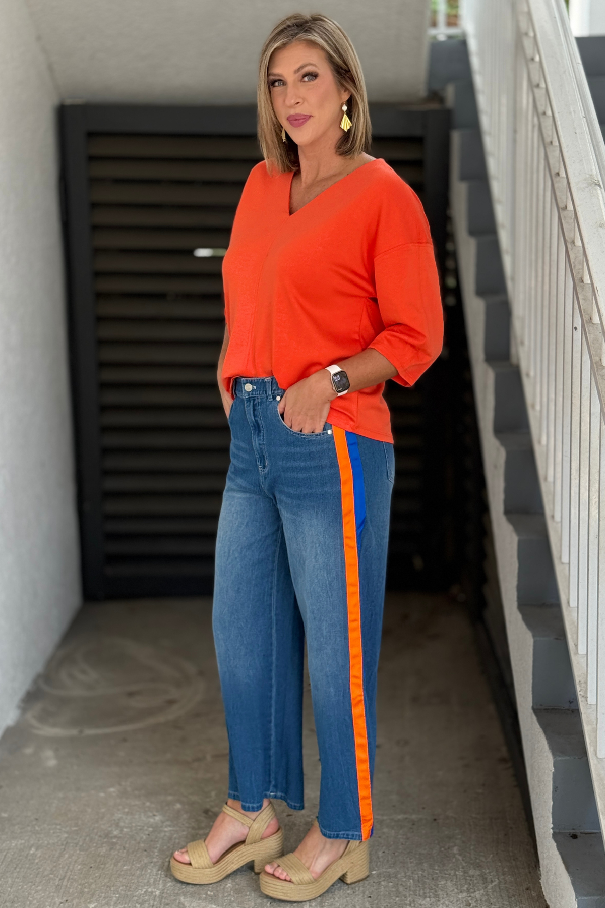 Women's relaxed denim pants with sporty side stripe trim