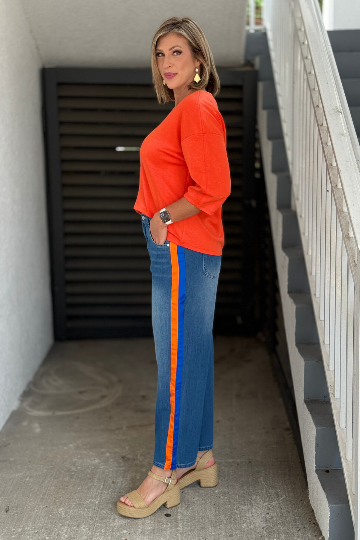 Pull-on washed denim pants with royal and orange side detailing