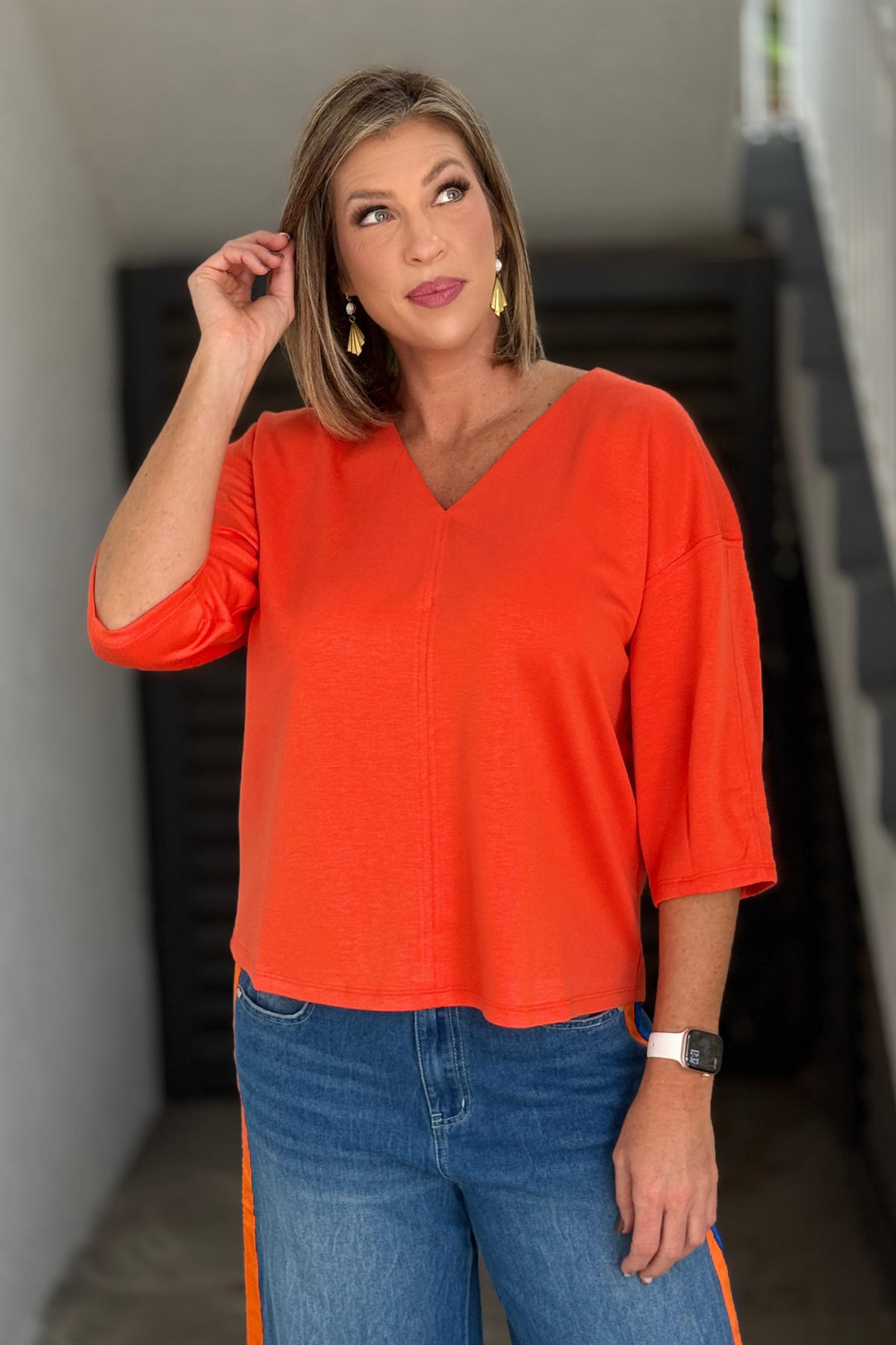 Orange boxy fit boutique top for fall