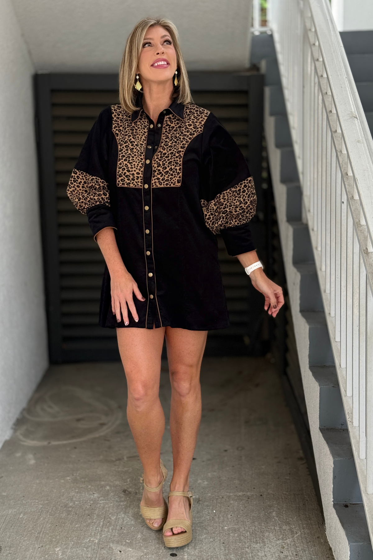 Women’s black corduroy dress with 3/4 puff sleeves