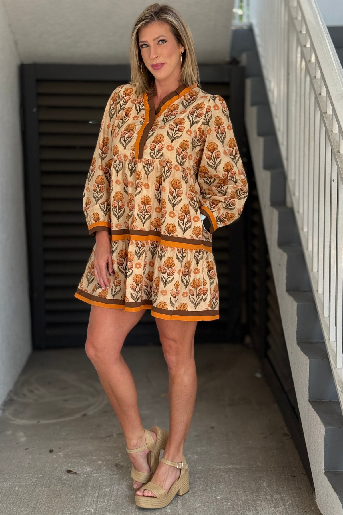 Women's rust floral long sleeve tiered mini dress