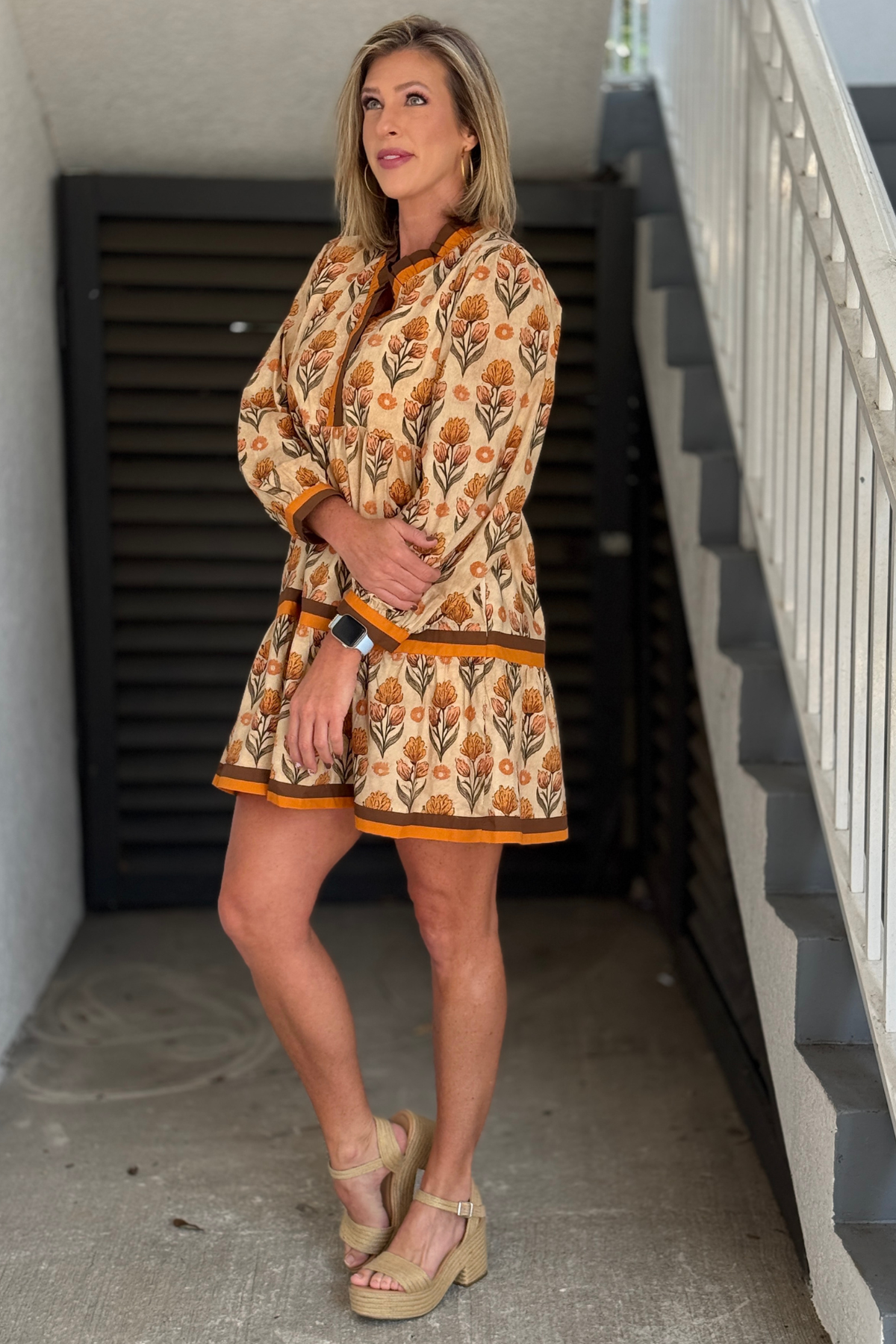 Floral mini dress with ruffled neckline and contrast trim