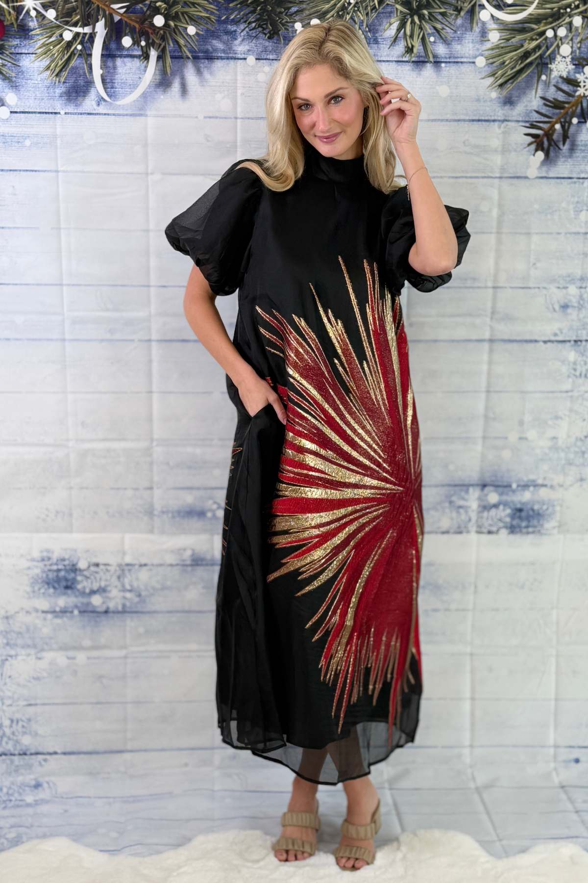 Black metallic starburst midi dress with red and gold design