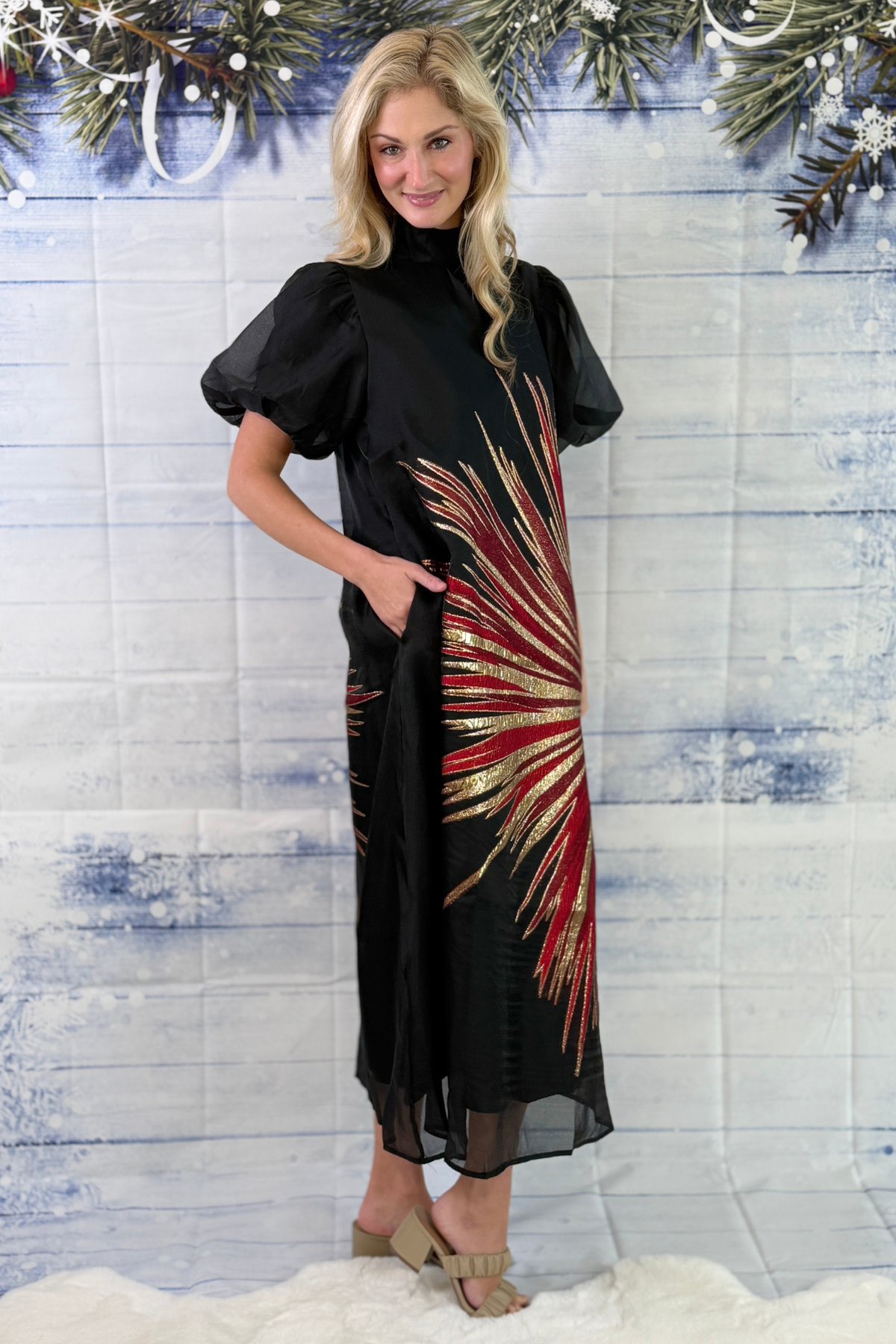 Women’s black Christmas party dress with sheer puff sleeves
