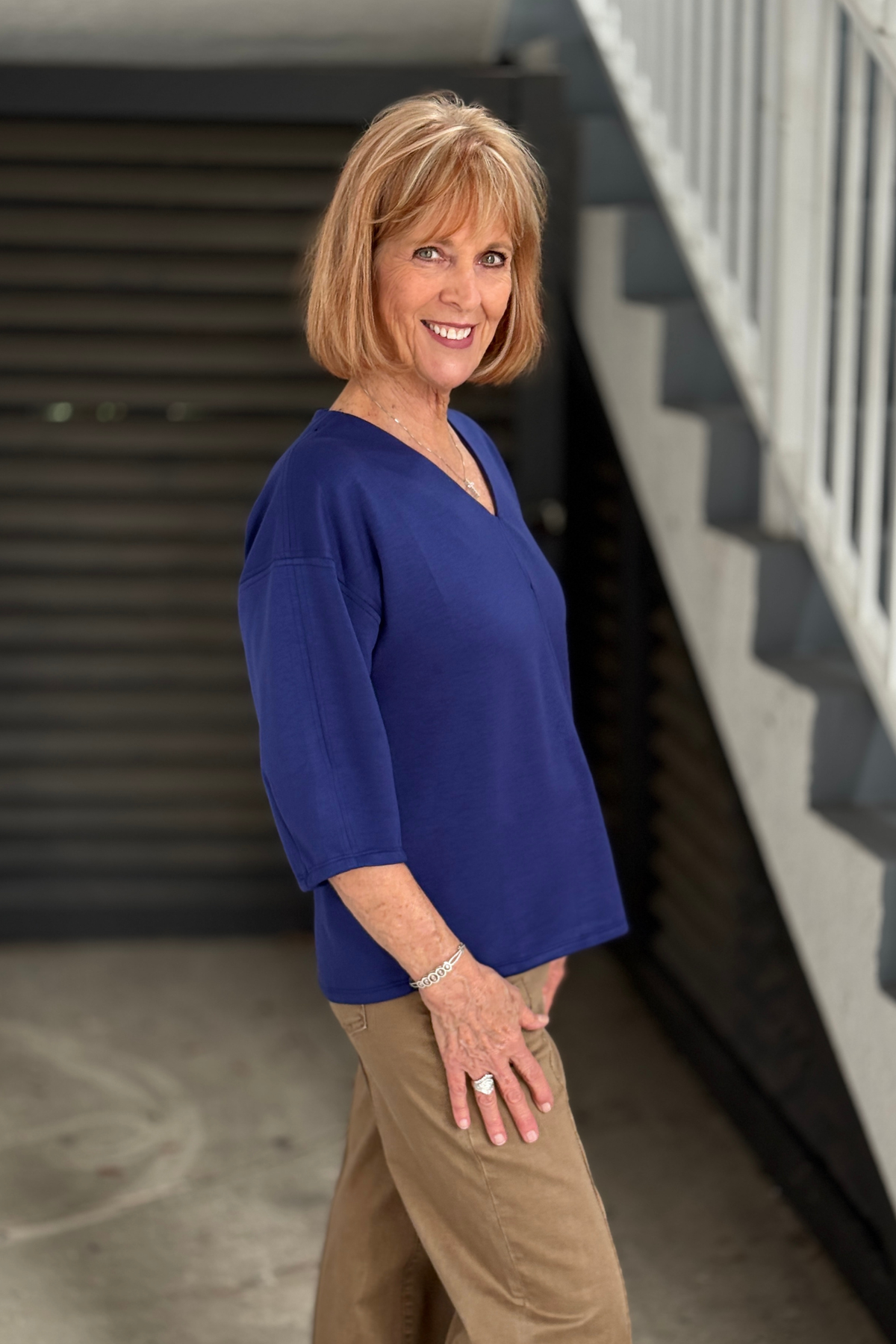 Relaxed fit navy V-neck blouse with center seam