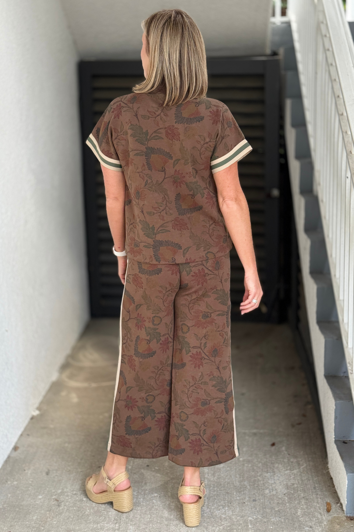 Women’s floral pant set in brown with cream and green striped trim