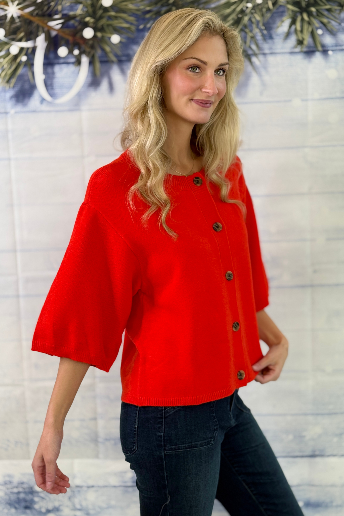 Soft red button down cardigan for holiday layering  
