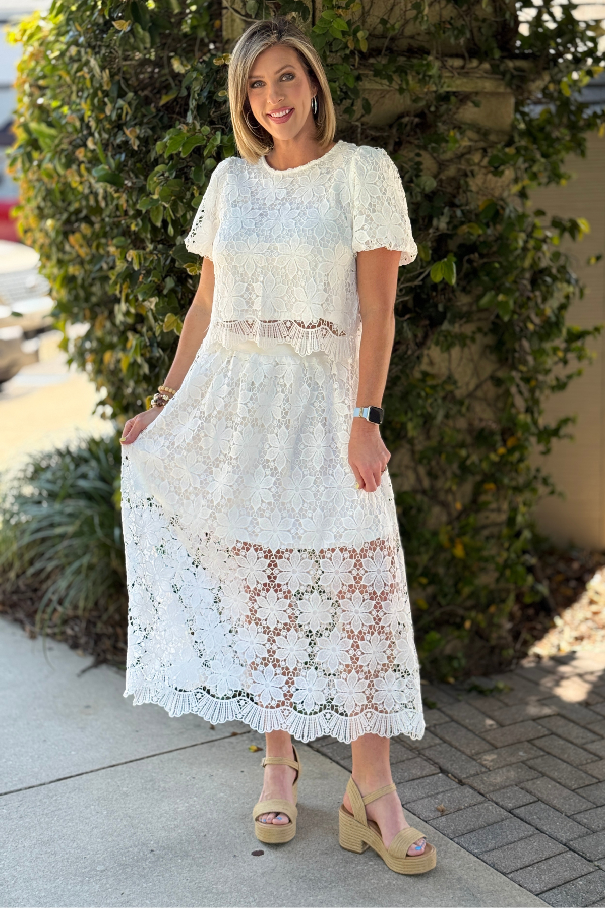 white lace midi skirt with scalloped hem detail