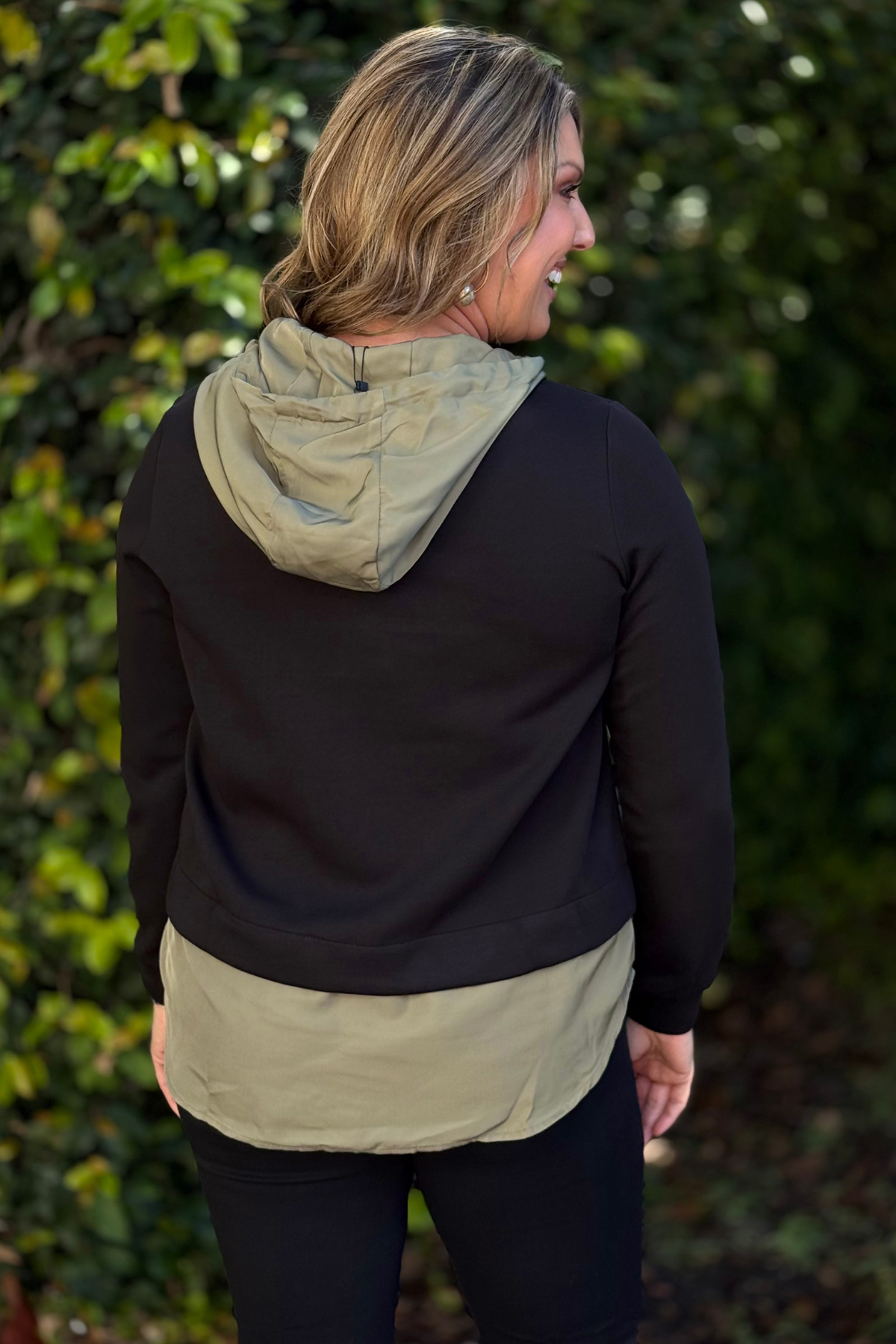 Black and olive colorblock hoodie with ruffle detail
