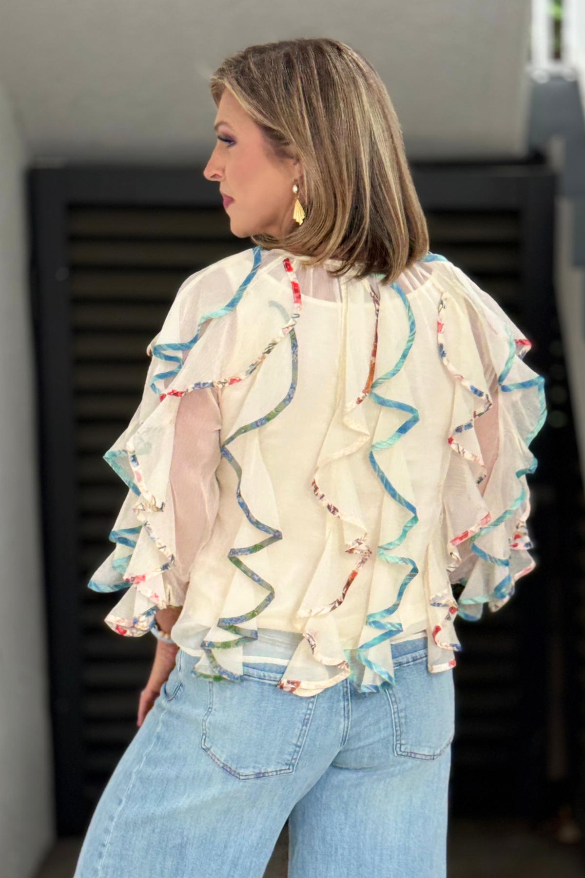 lightweight statement blouse with layered ruffles
