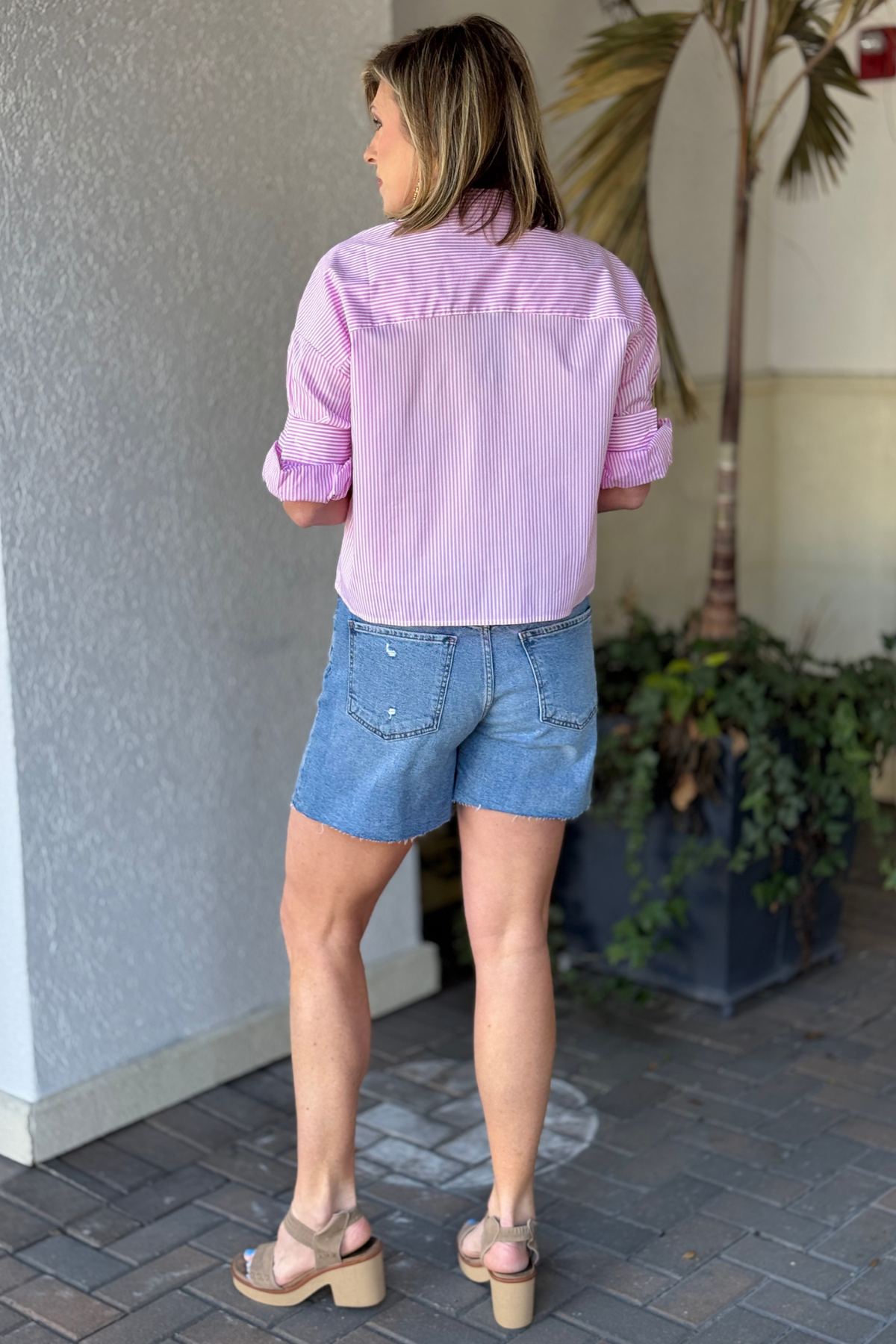 Medium wash longer inseam women’s denim shorts