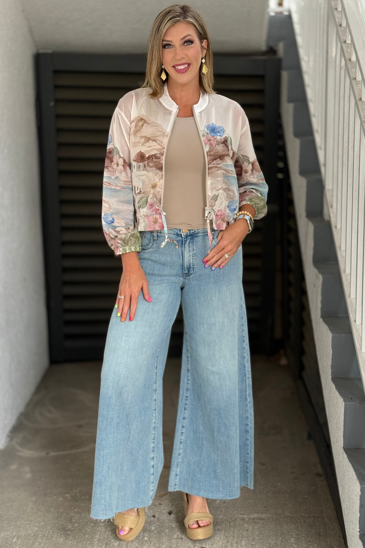 Light wash Transcendent wide leg denim jeans with raw hem