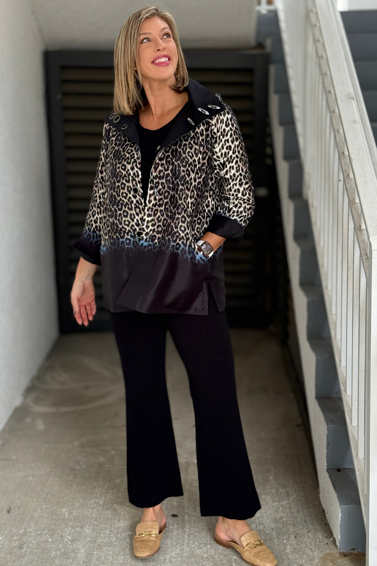 Women’s leopard print reversible jacket with black border and pockets