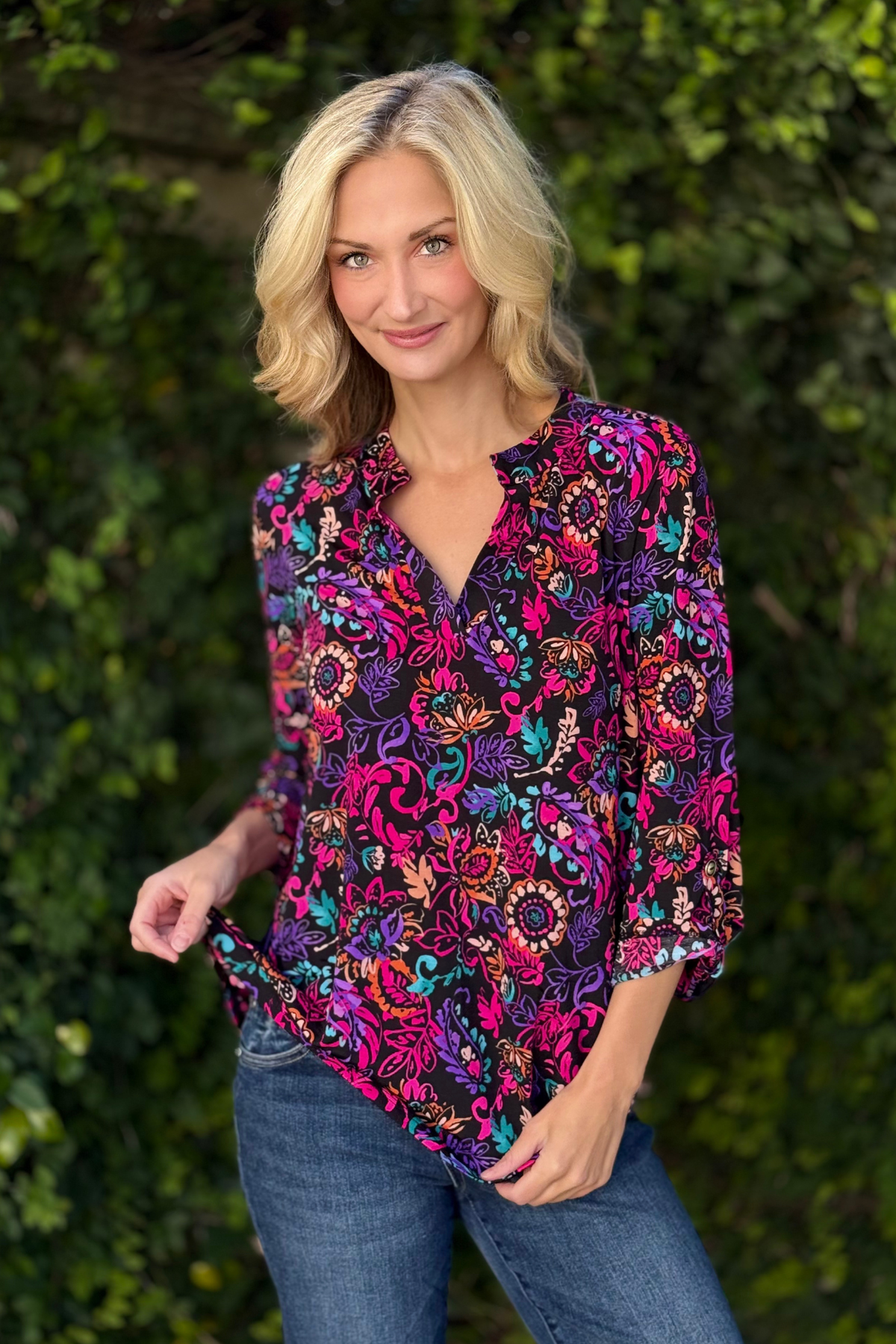 The Color Me Happy Top from TPN Collection in black multi floral