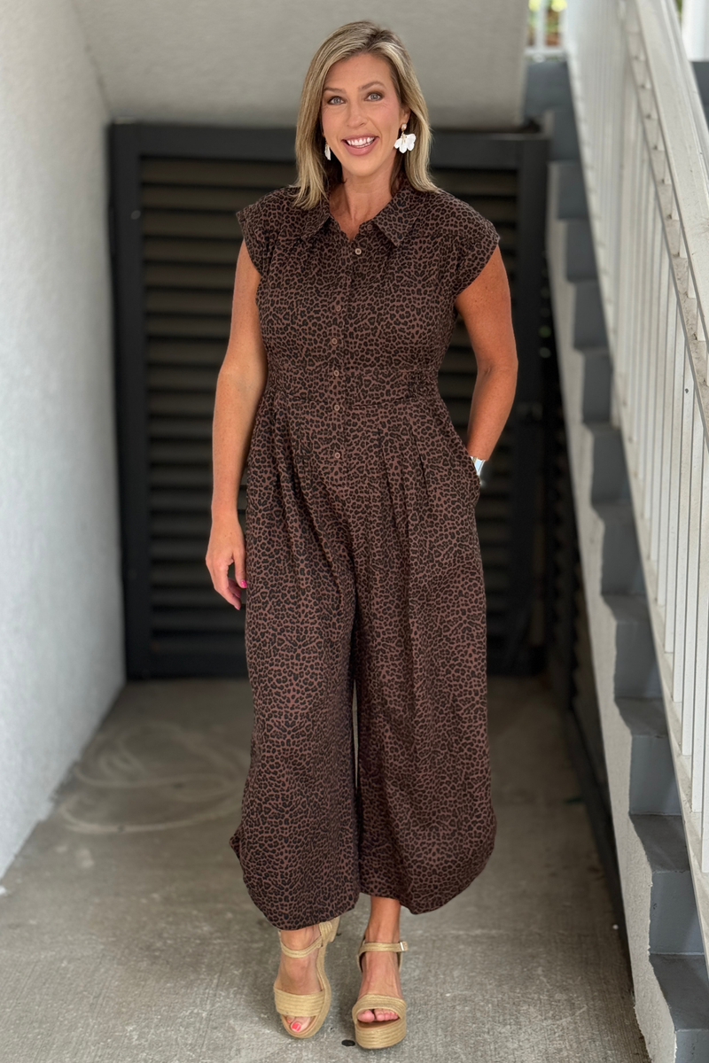 Front view of The Wild Instinct Drawstring Jumpsuit in leopard print.