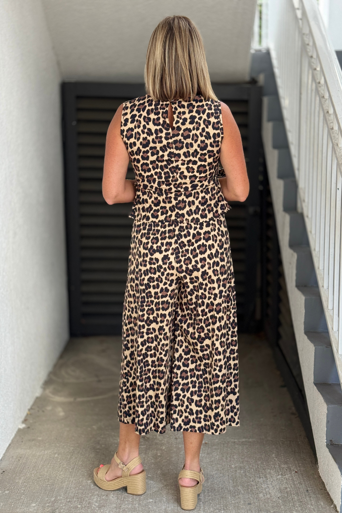 Leopard palazzo pants styled with matching wrap top