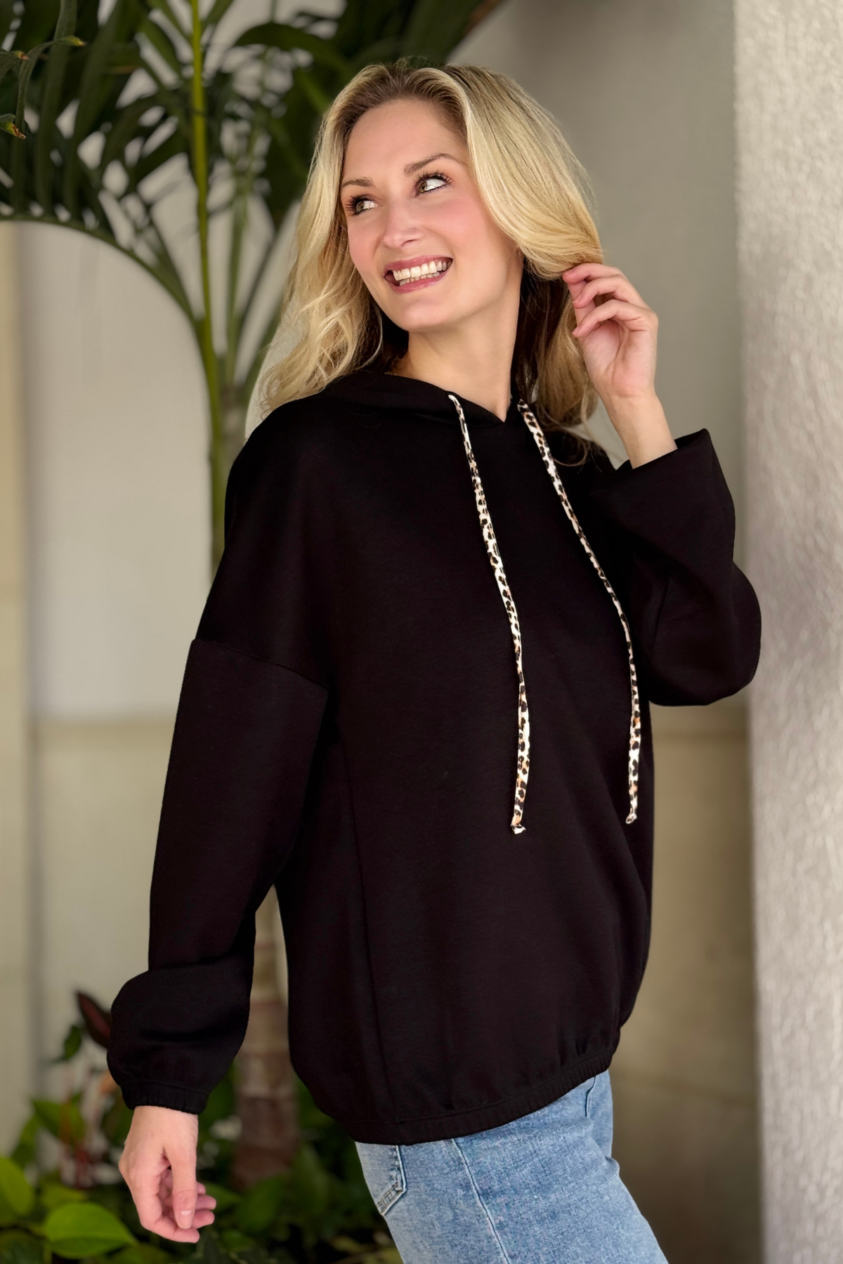 Casual women’s leopard drawstring sweatshirt front view