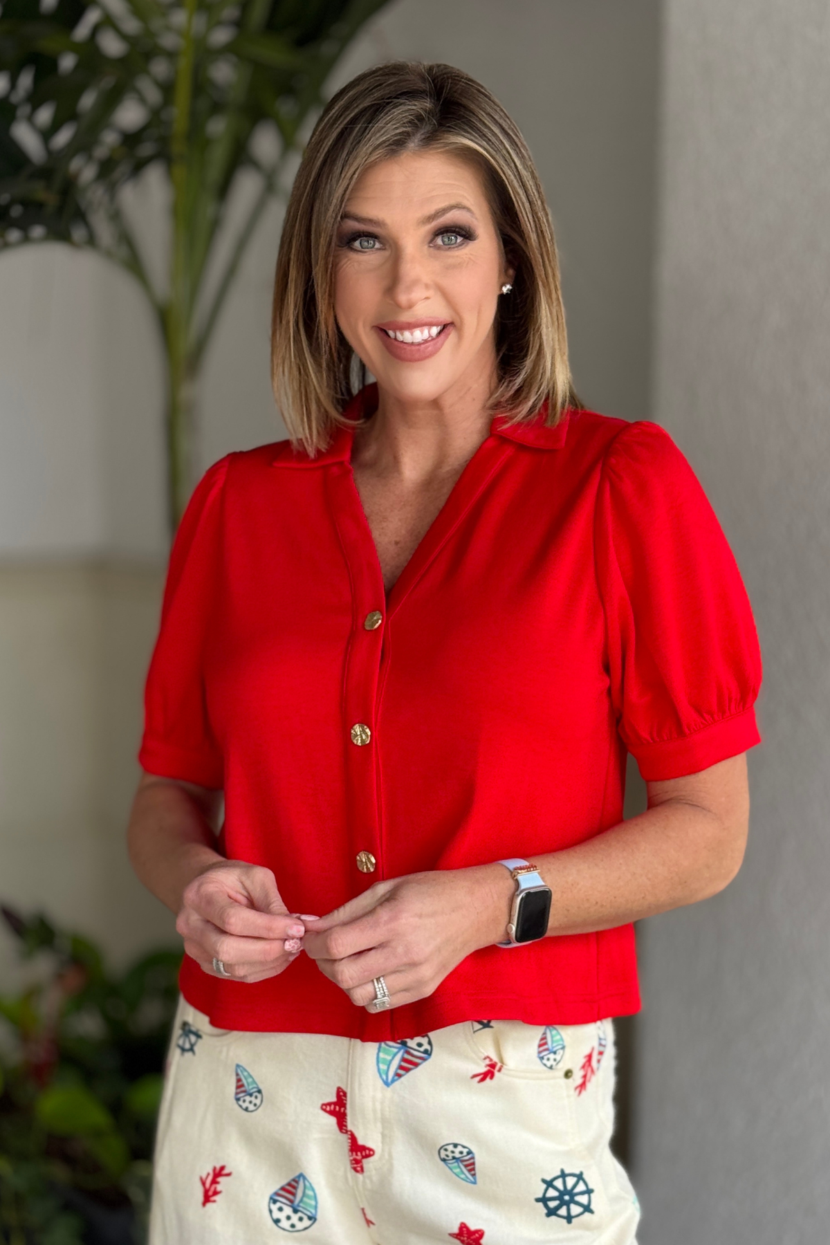 Lightweight red button down top styled with denim