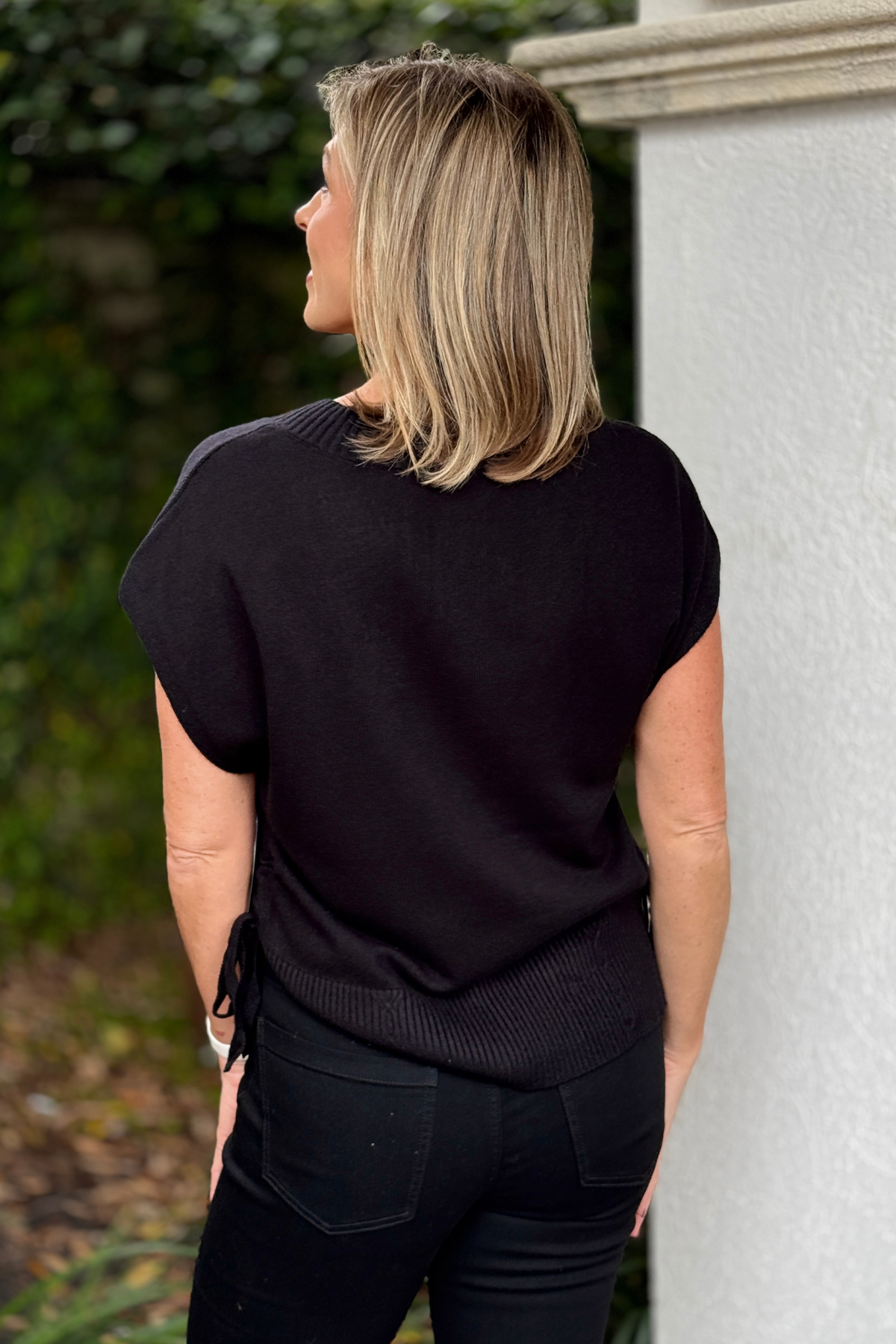 Women's Liverpool side tie sweater styled with black denim