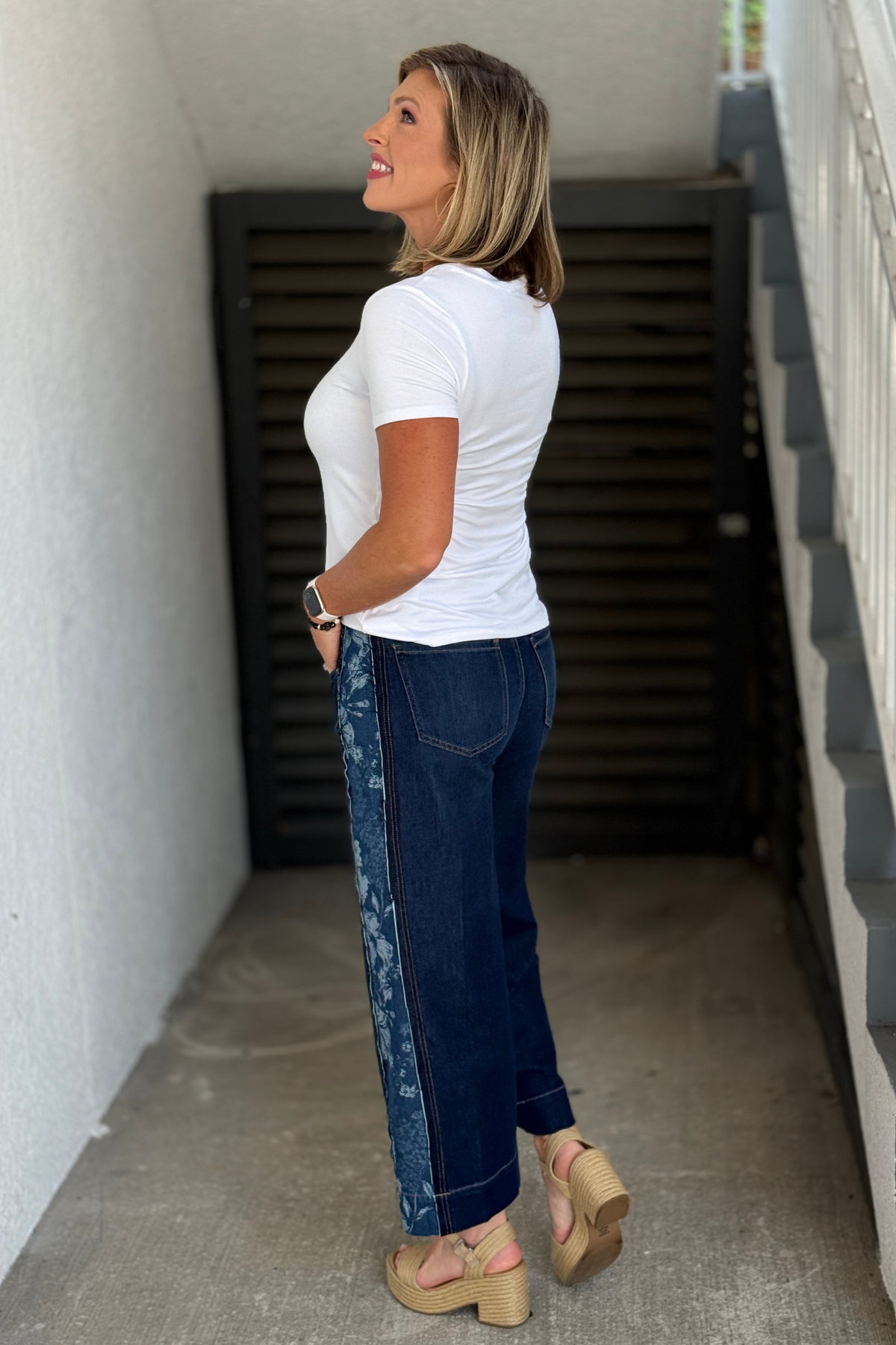 Women’s Liverpool Stride jeans styled with a white V-neck tee
