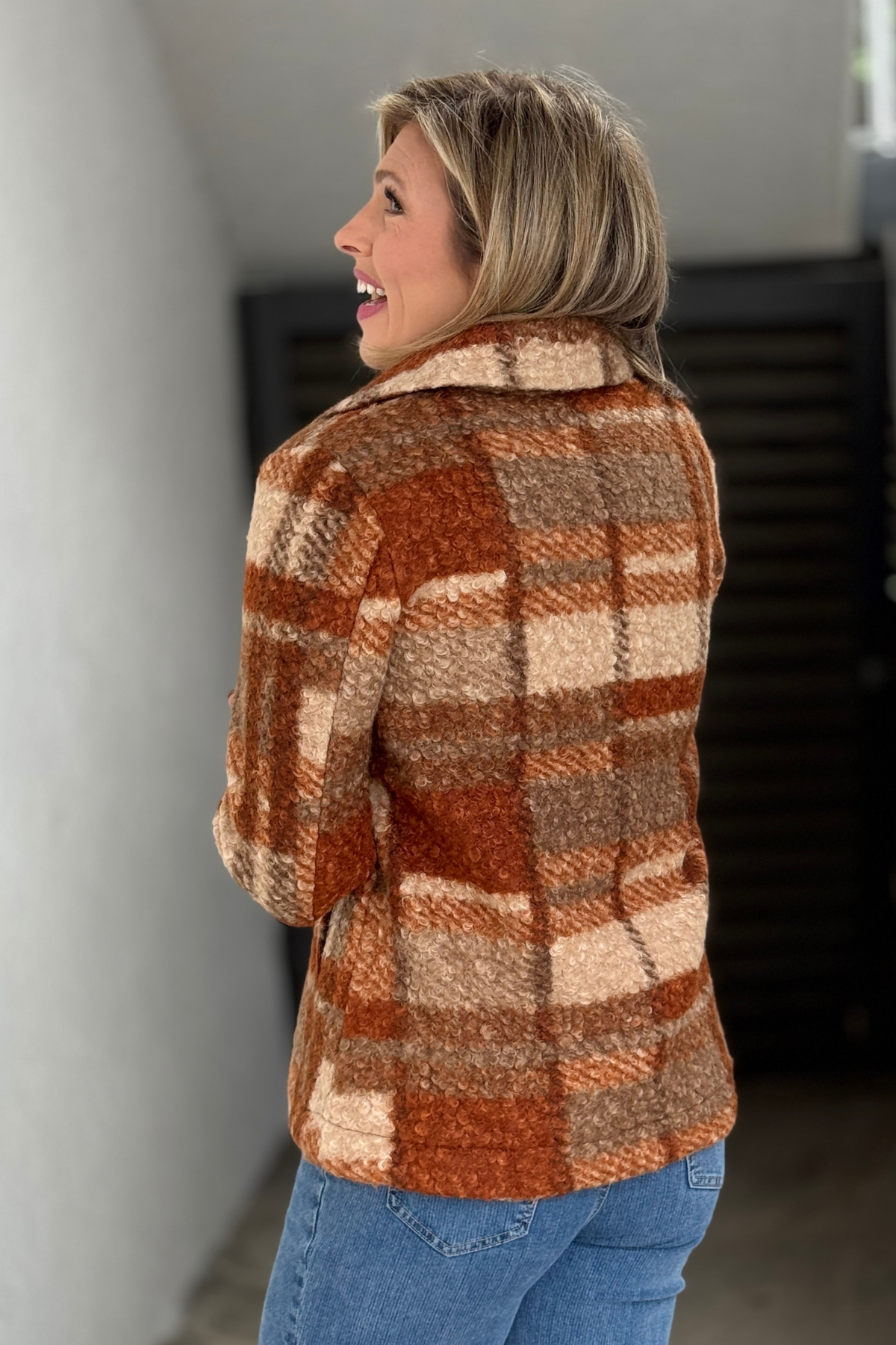 Back view of Liverpool plaid sherpa peacoat in warm fall tones
